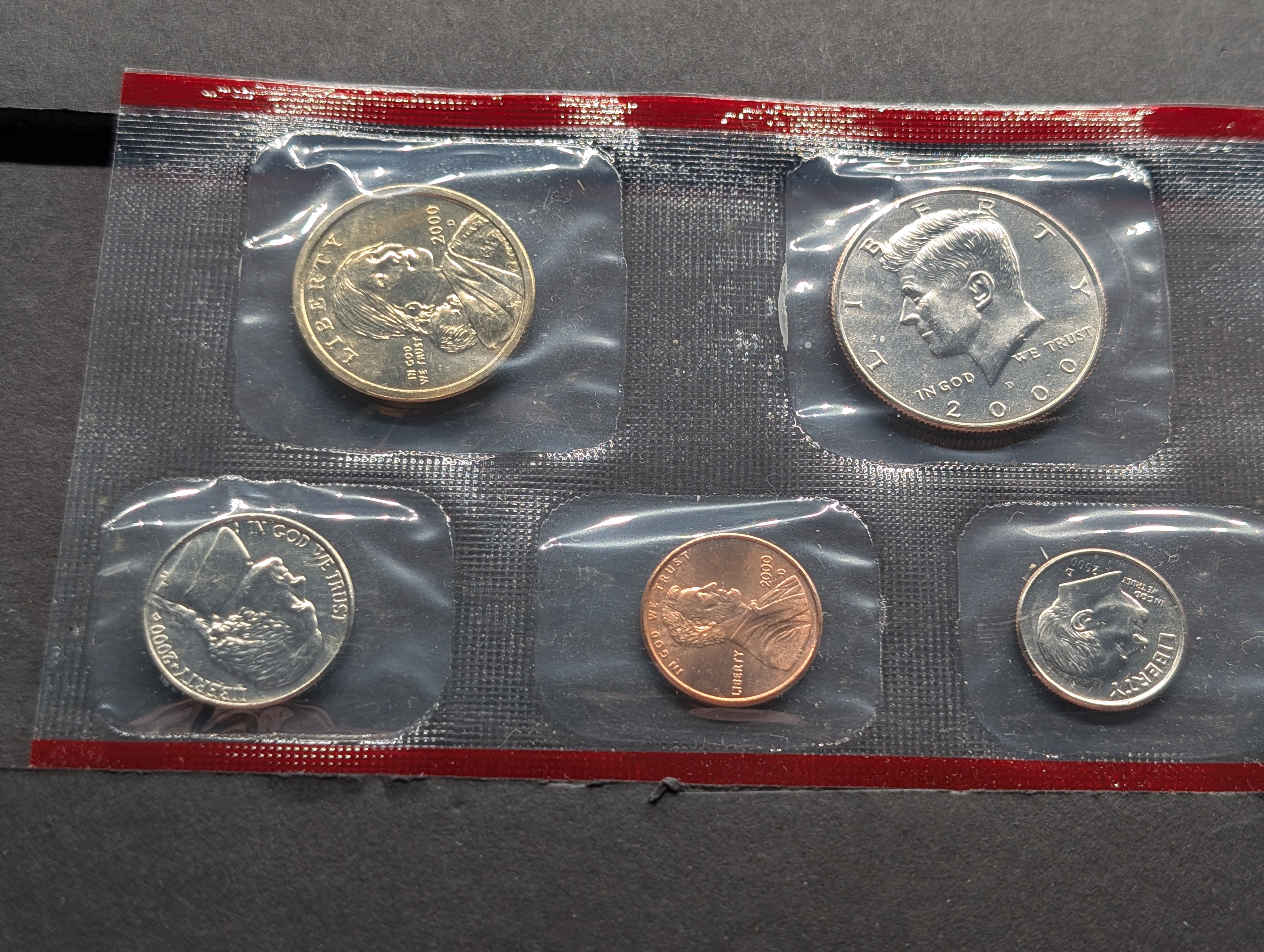 2000-P&D Unc. U.S. Mint Set with State Quarters and Sacagawea Dollar in OGP w/ COA