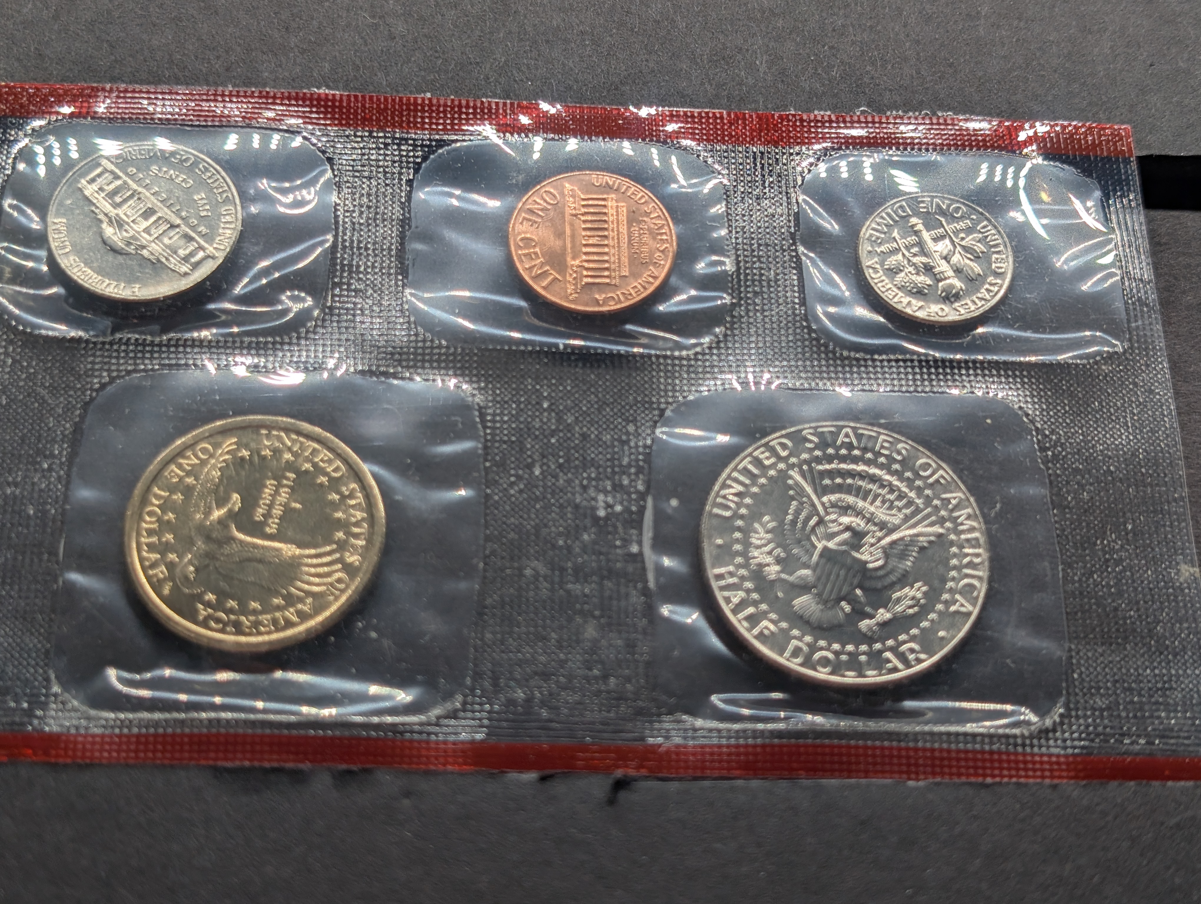 2000-P&D Unc. U.S. Mint Set with State Quarters and Sacagawea Dollar in OGP w/ COA