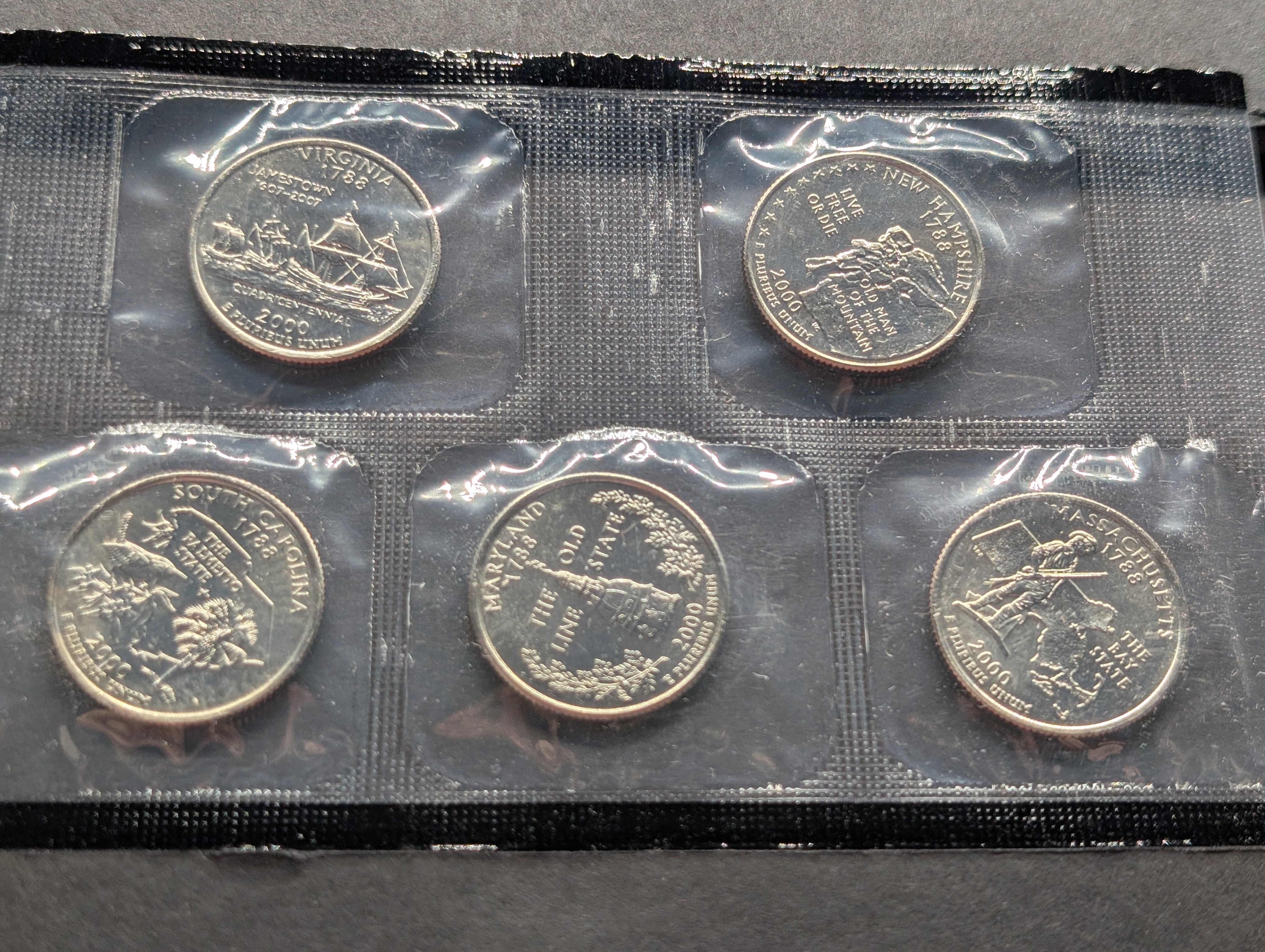 2000-P&D Unc. U.S. Mint Set with State Quarters and Sacagawea Dollar in OGP w/ COA