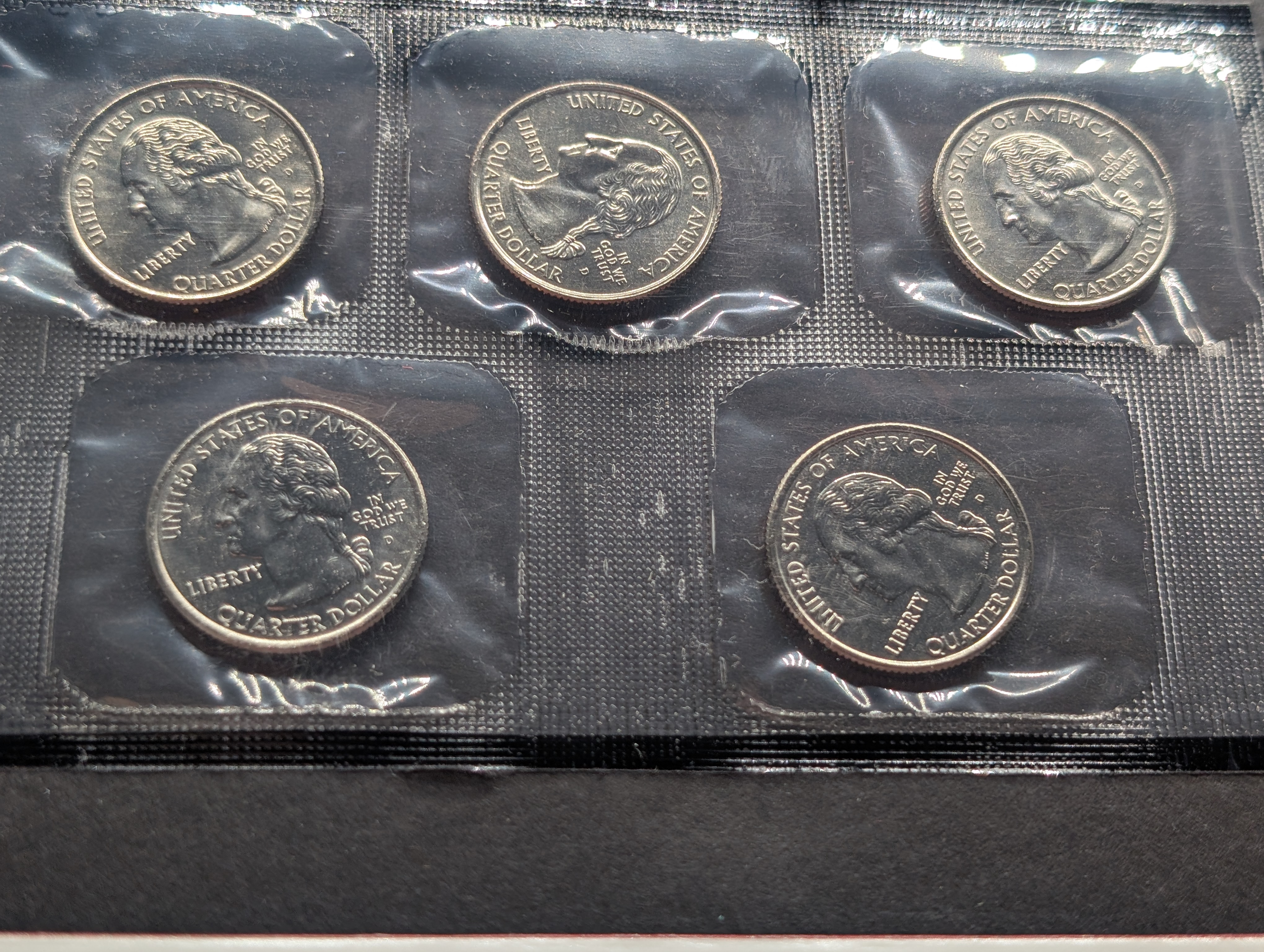 2000-P&D Unc. U.S. Mint Set with State Quarters and Sacagawea Dollar in OGP w/ COA
