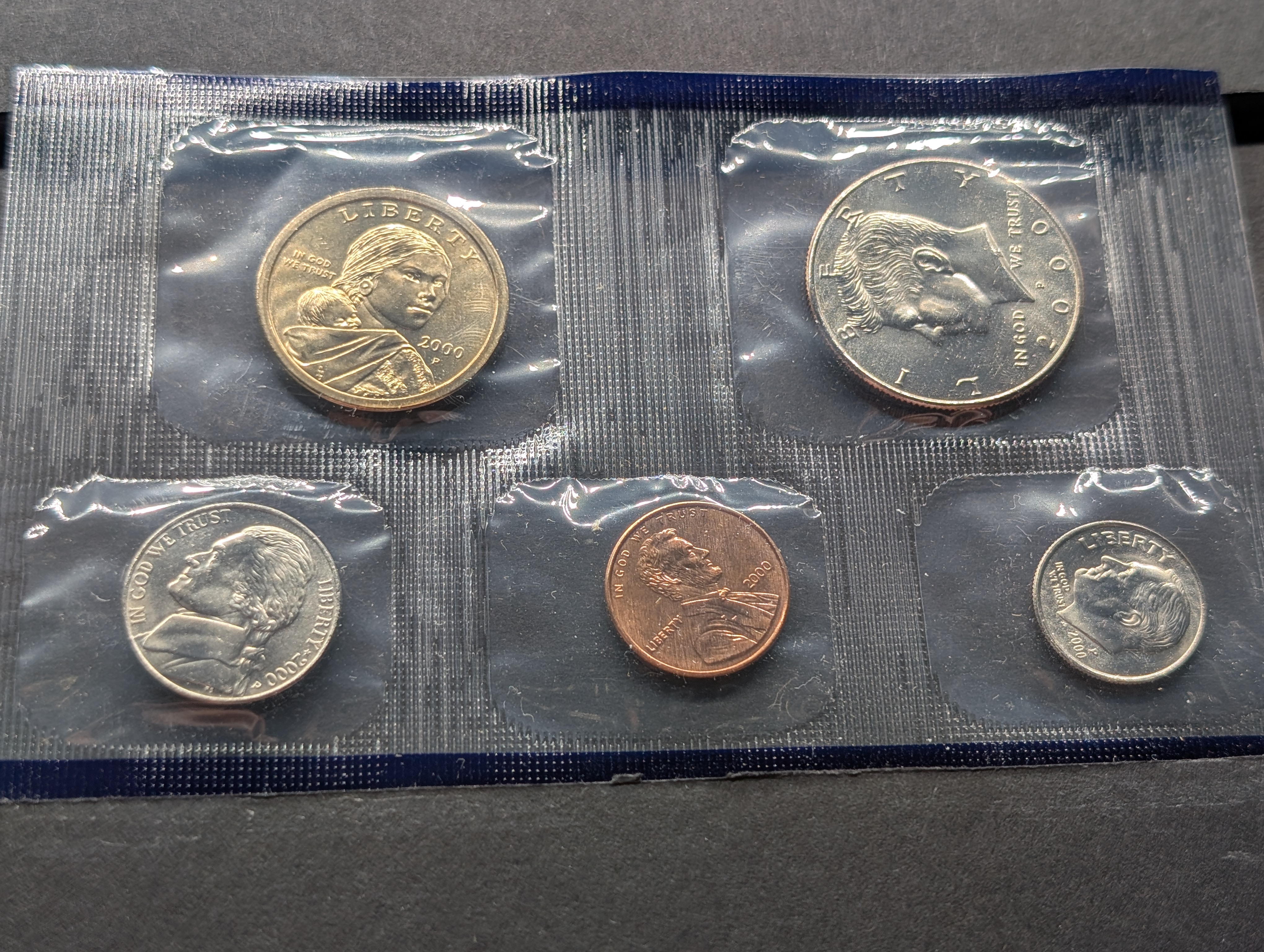 2000-P&D Unc. U.S. Mint Set with State Quarters and Sacagawea Dollar in OGP w/ COA