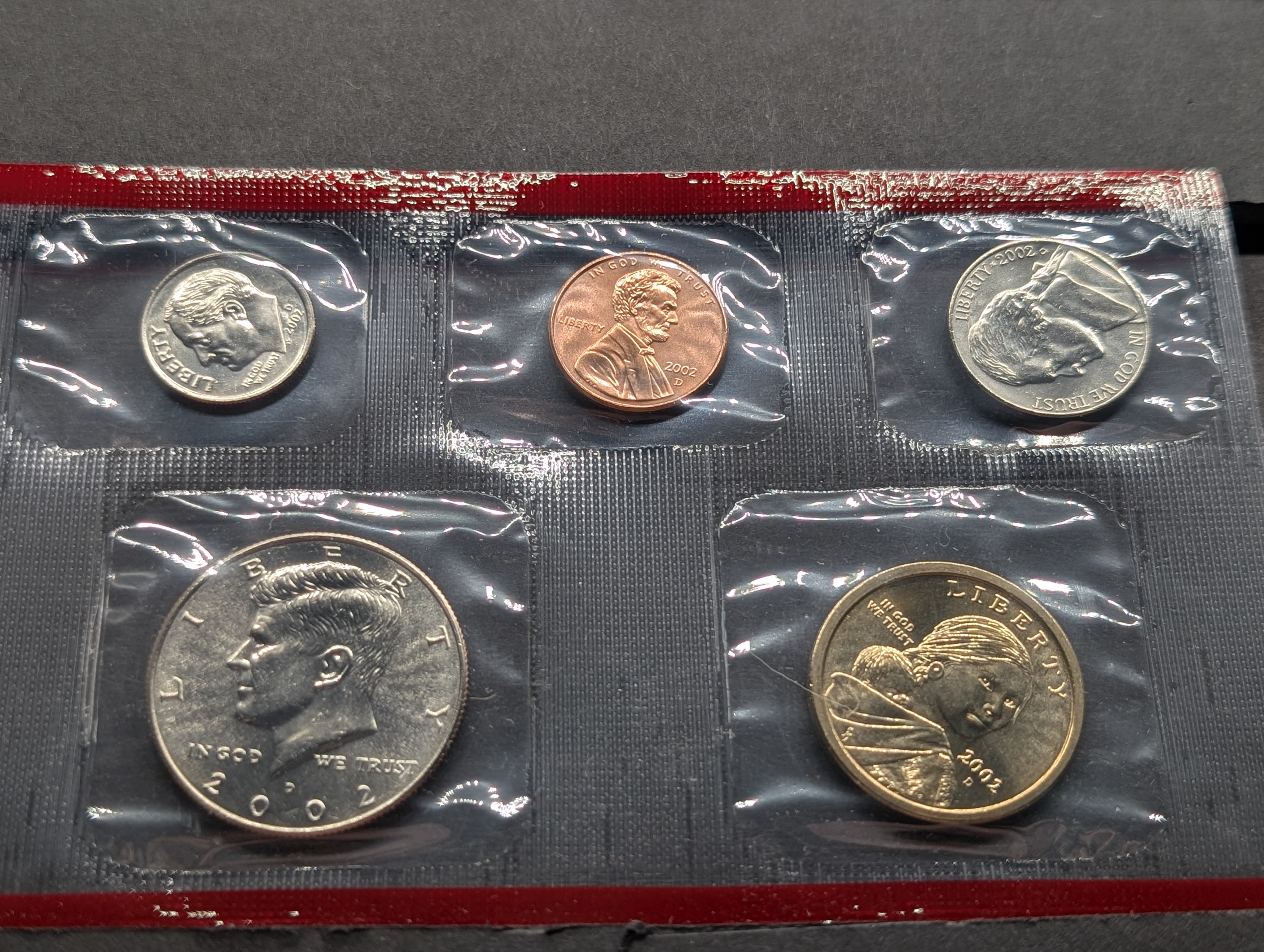 2002-P&D Unc. U.S. Mint Set with State Quarters and Sacagawea Dollar in OGP w/ COA