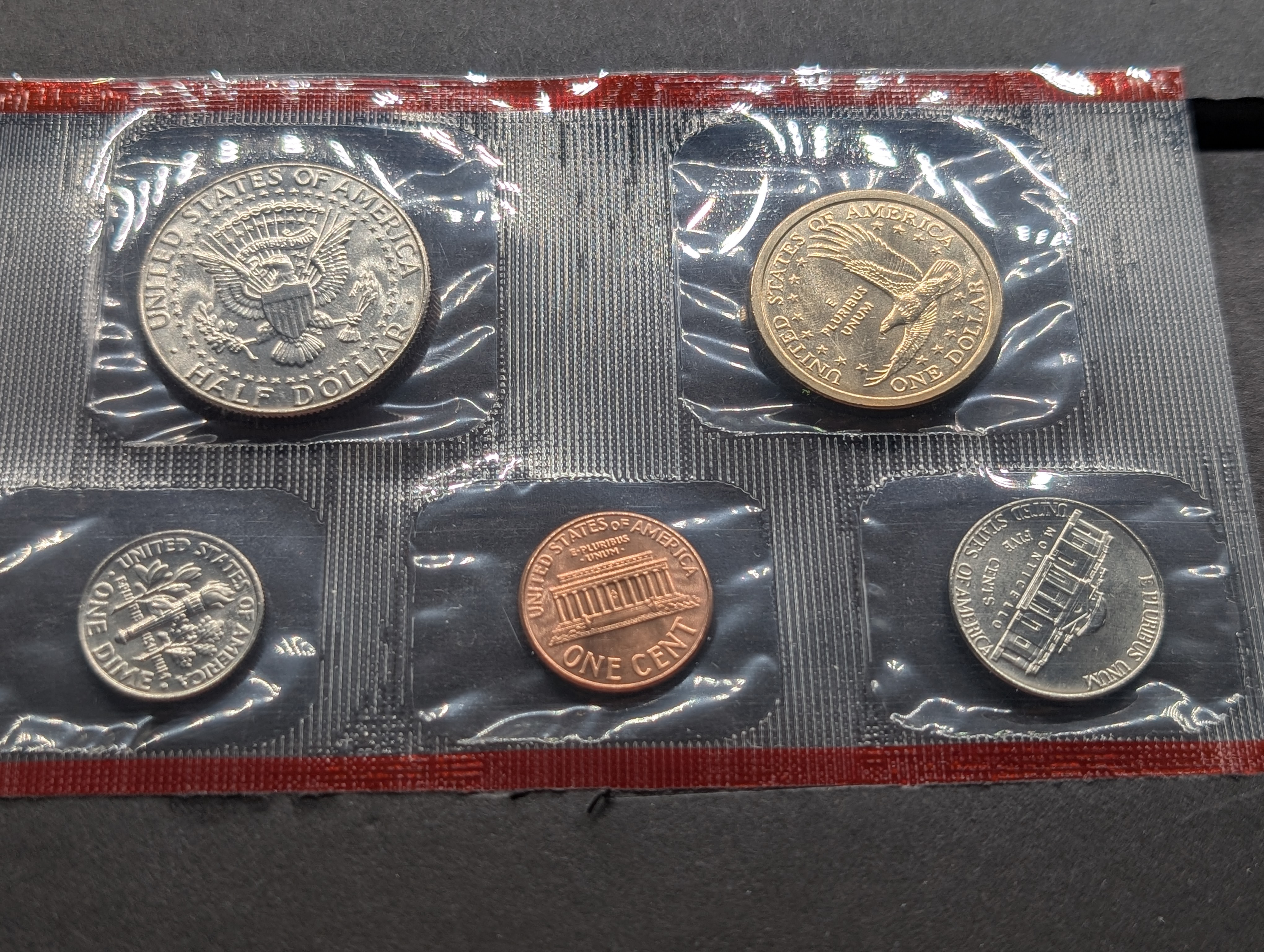 2002-P&D Unc. U.S. Mint Set with State Quarters and Sacagawea Dollar in OGP w/ COA