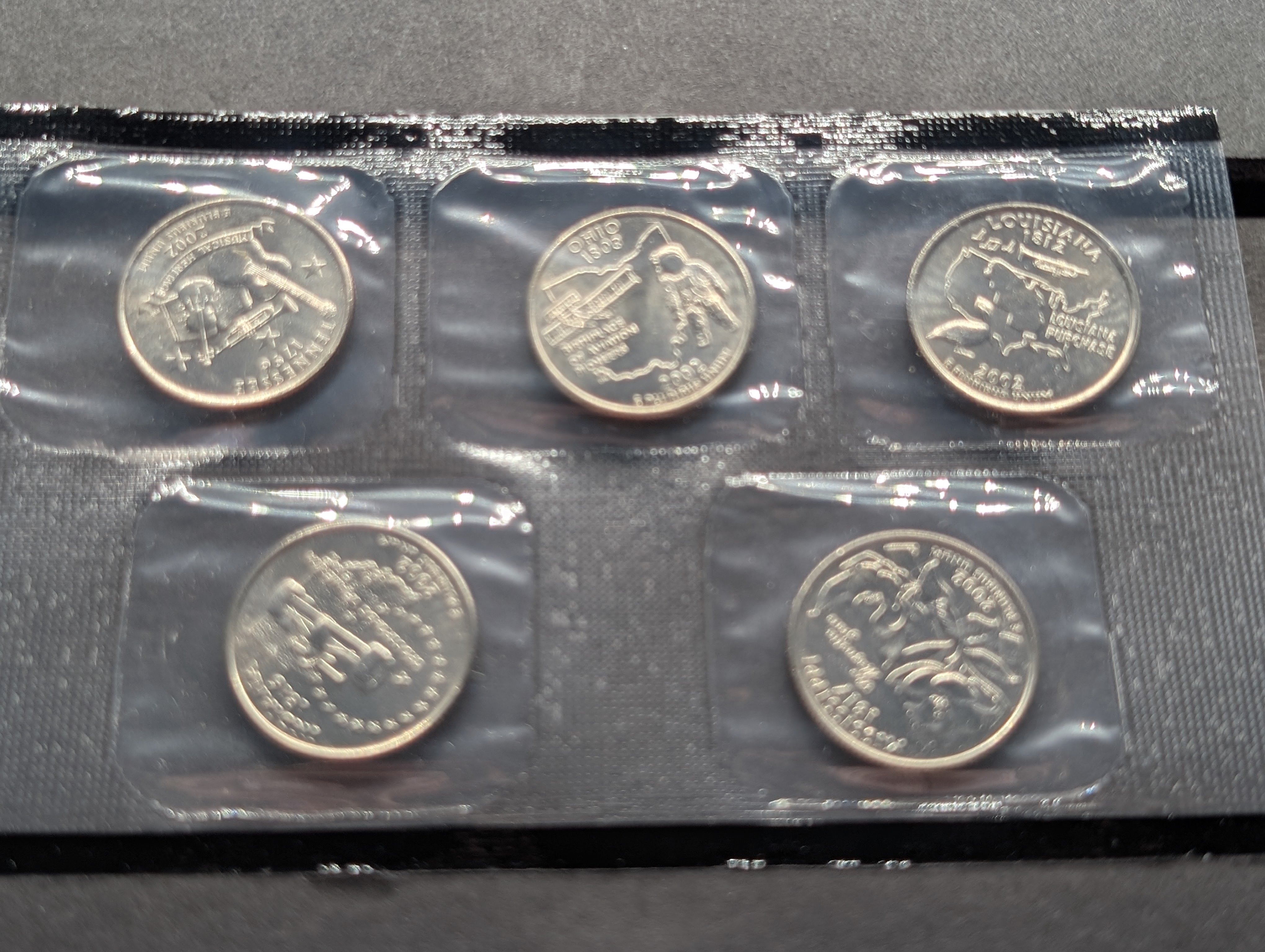 2002-P&D Unc. U.S. Mint Set with State Quarters and Sacagawea Dollar in OGP w/ COA