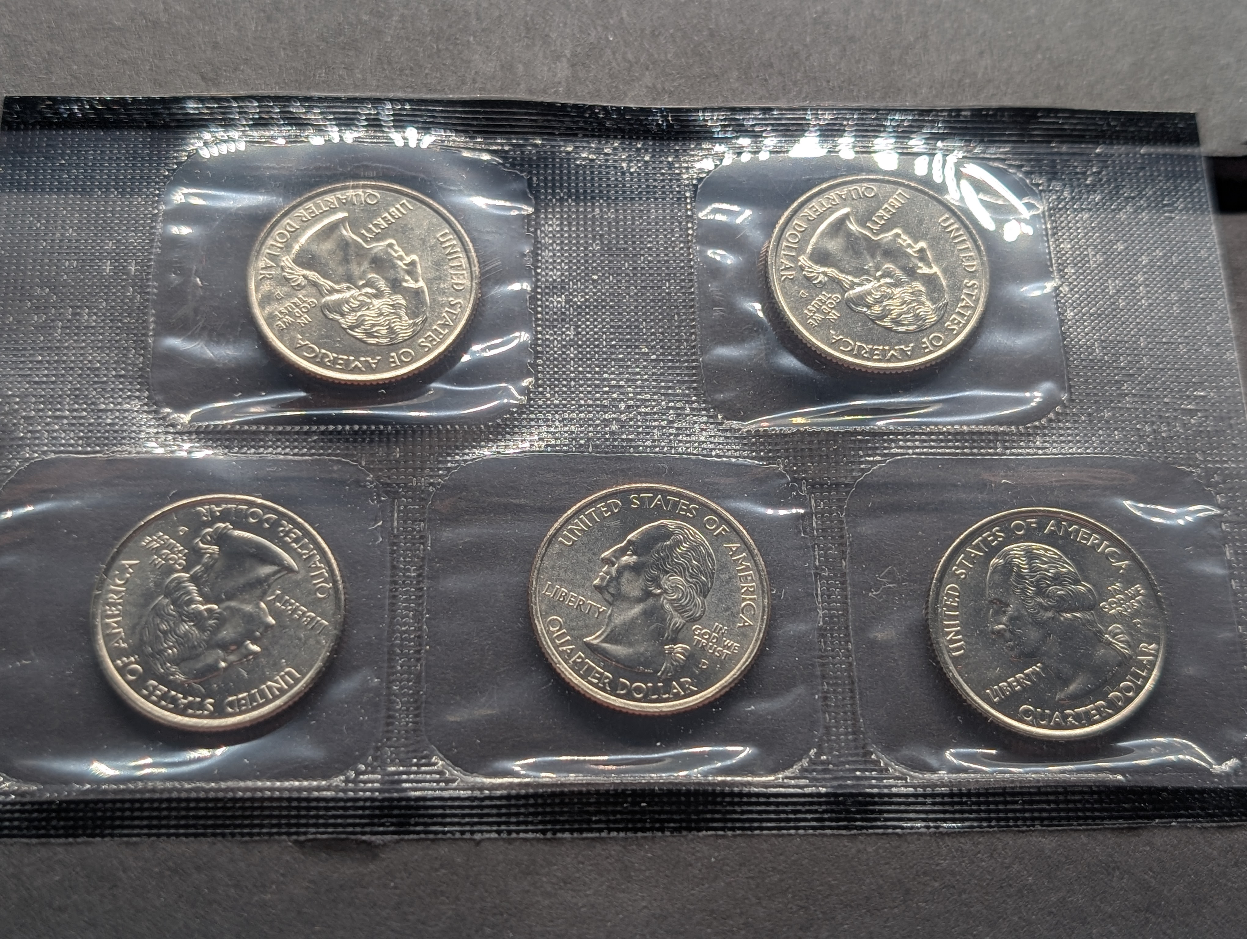 2002-P&D Unc. U.S. Mint Set with State Quarters and Sacagawea Dollar in OGP w/ COA