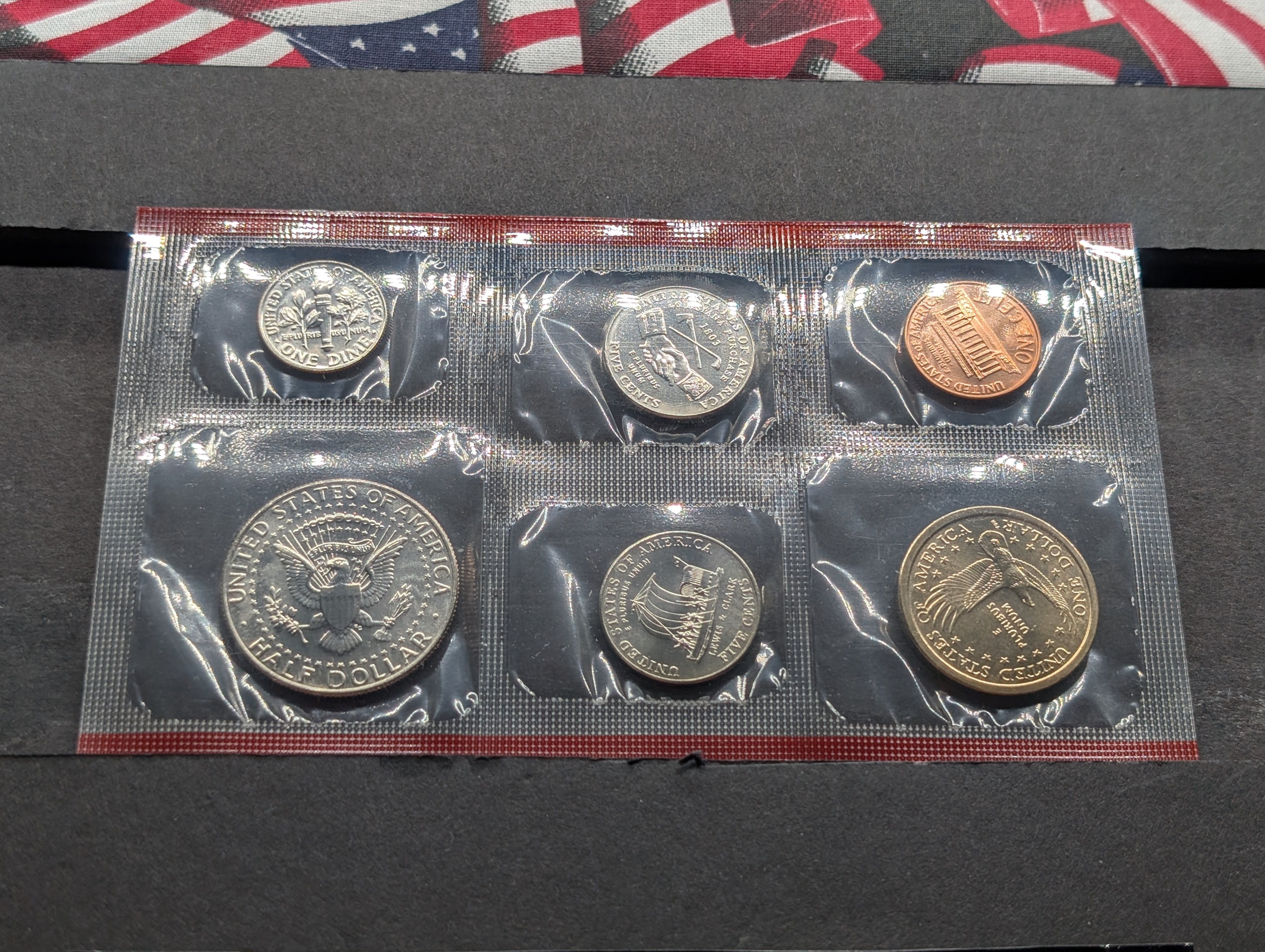 2004-P&D Unc. U.S. Mint Set with State Quarters and Sacagawea Dollar in OGP w/ COA