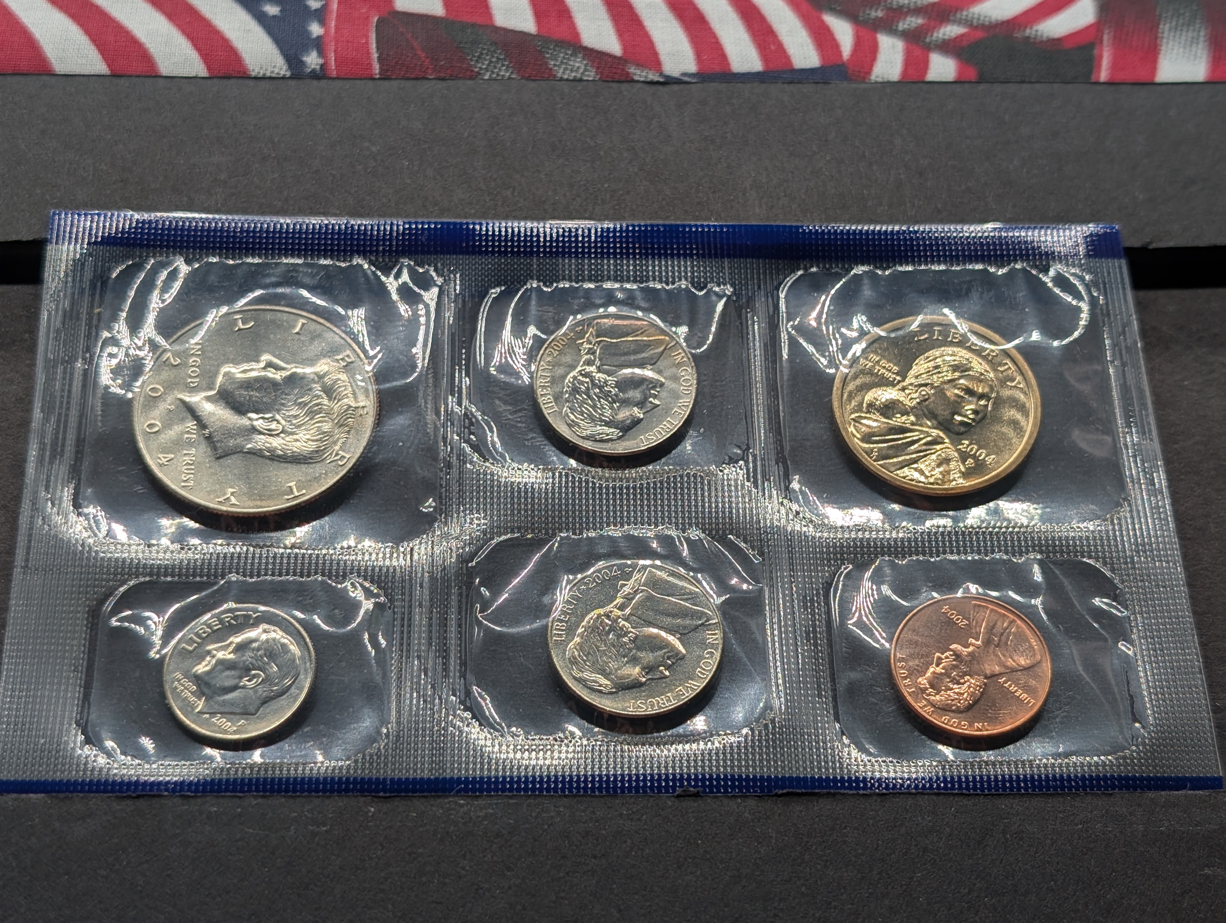 2004-P&D Unc. U.S. Mint Set with State Quarters and Sacagawea Dollar in OGP w/ COA
