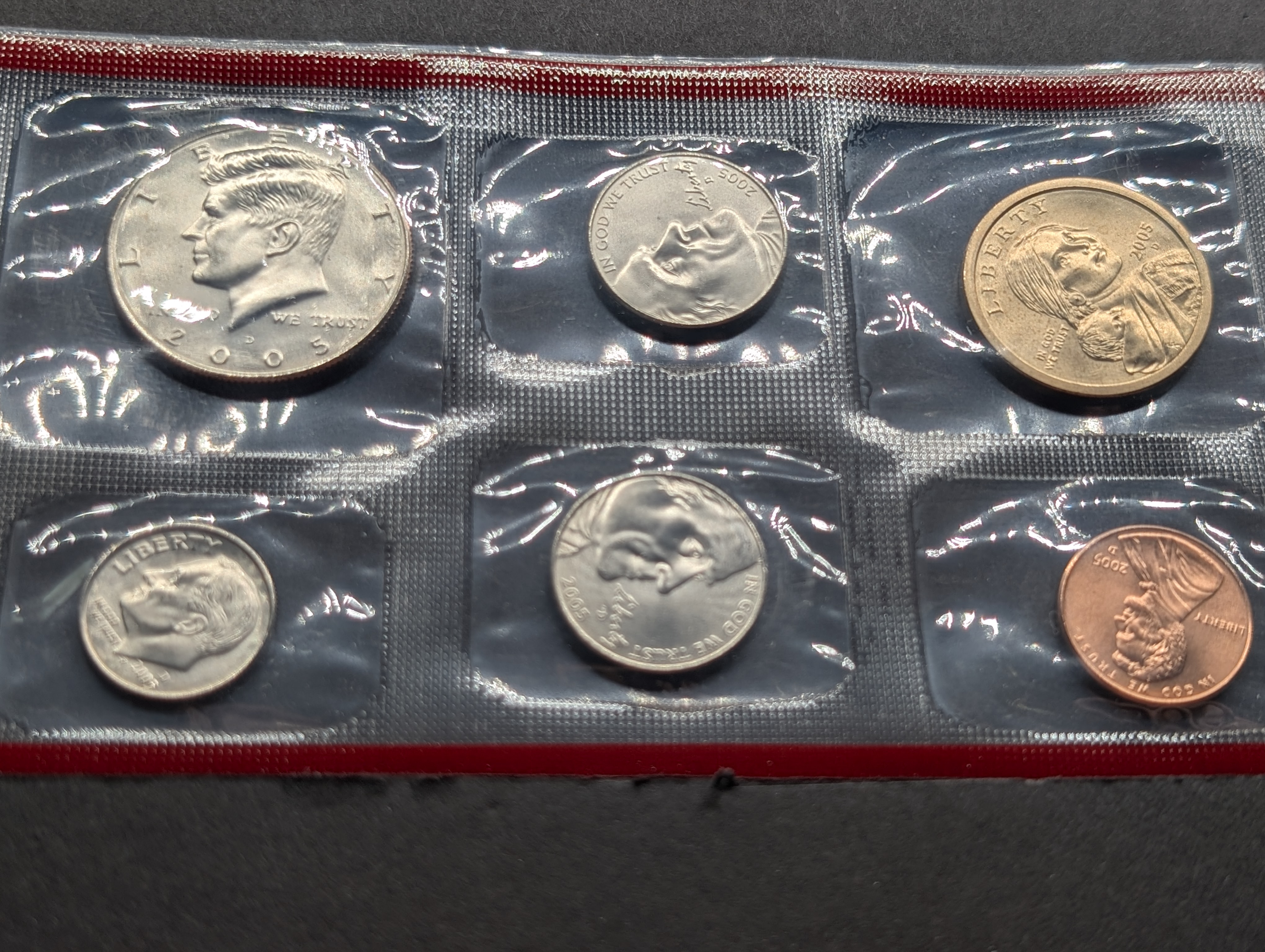 2005-P&D Unc. U.S. Mint Set with State Quarters and Sacagawea Dollar in OGP w/ COA