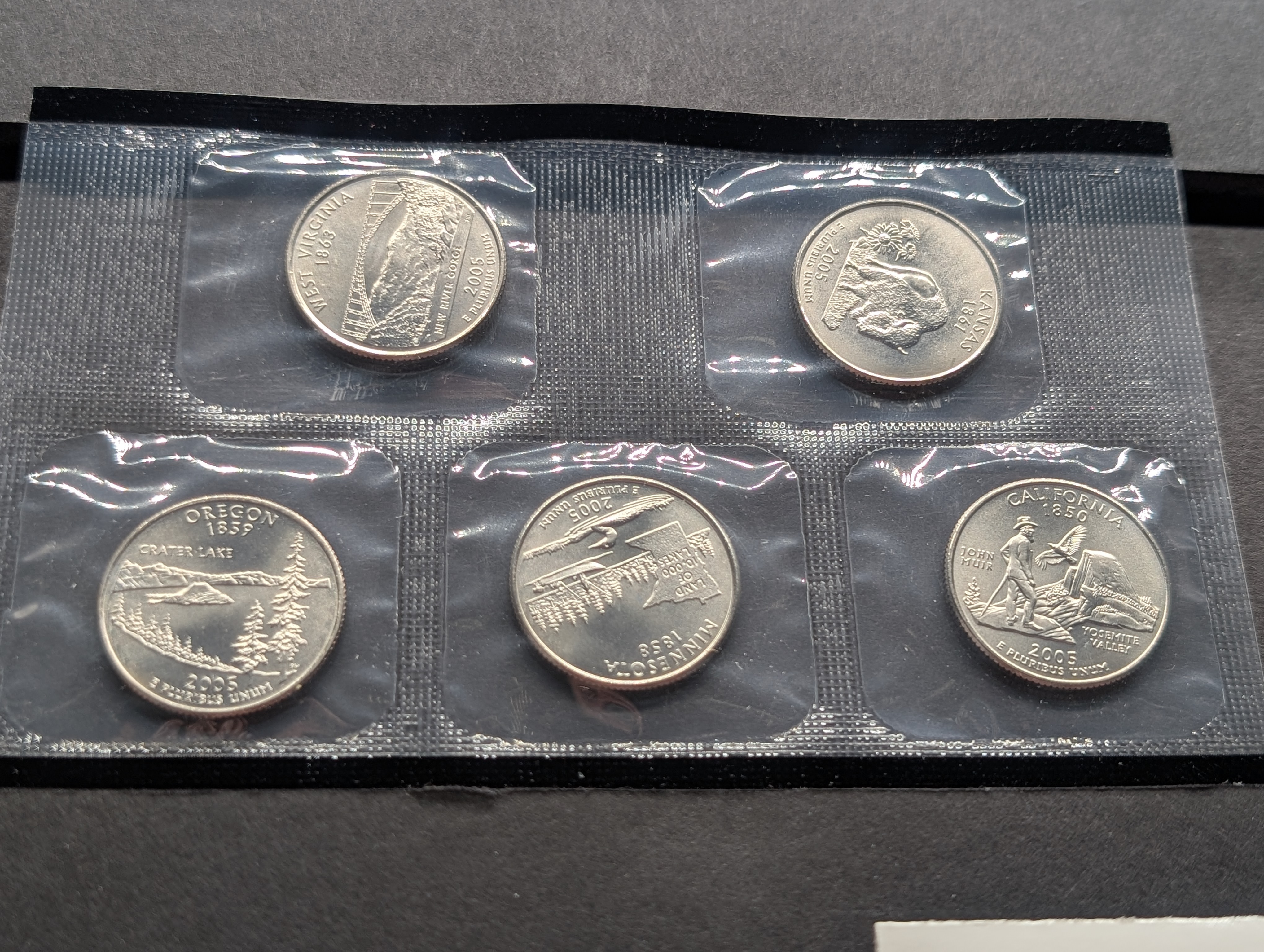 2005-P&D Unc. U.S. Mint Set with State Quarters and Sacagawea Dollar in OGP w/ COA