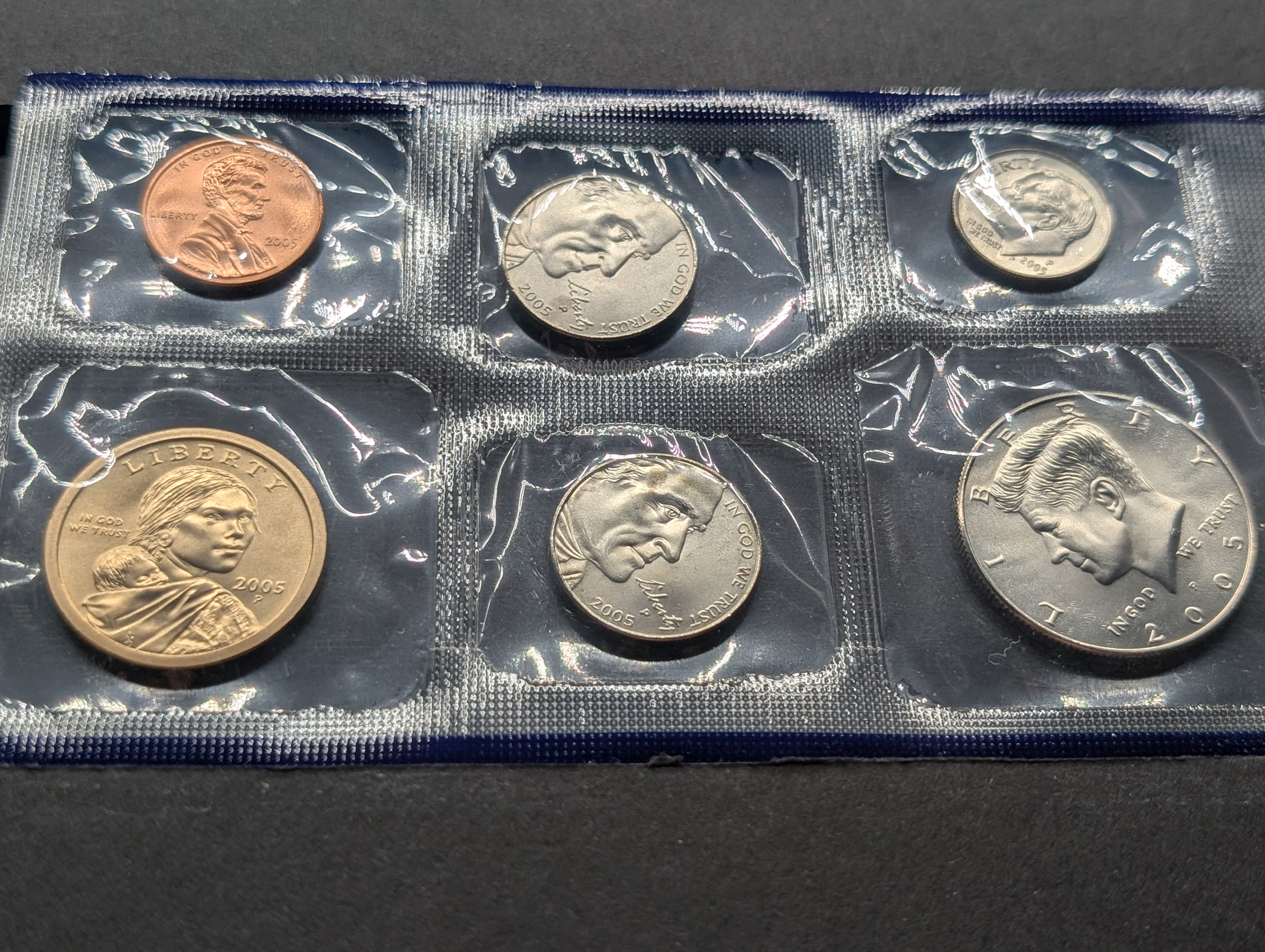 2005-P&D Unc. U.S. Mint Set with State Quarters and Sacagawea Dollar in OGP w/ COA