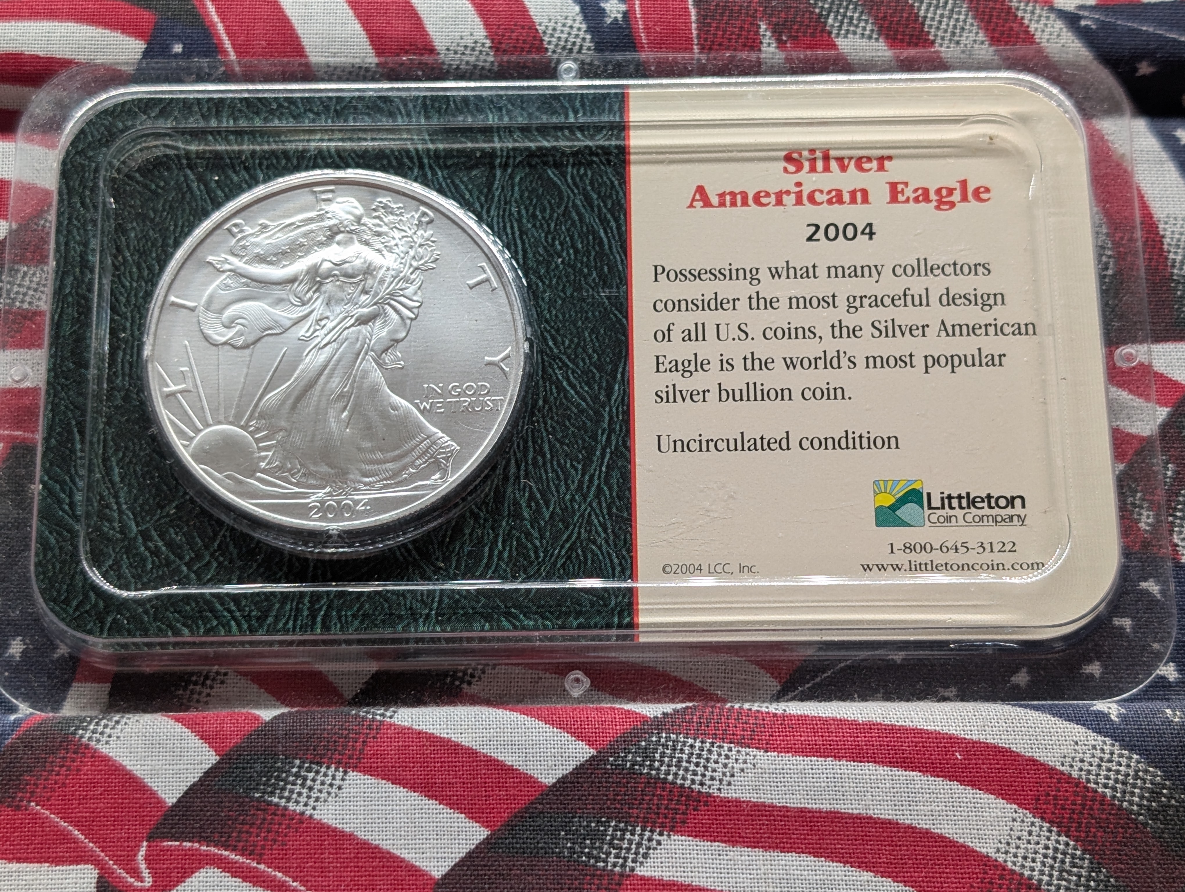 2004 American Silver Eagle In Littleton Plastic Holder, 99.9% Silver, One Troy Ounce