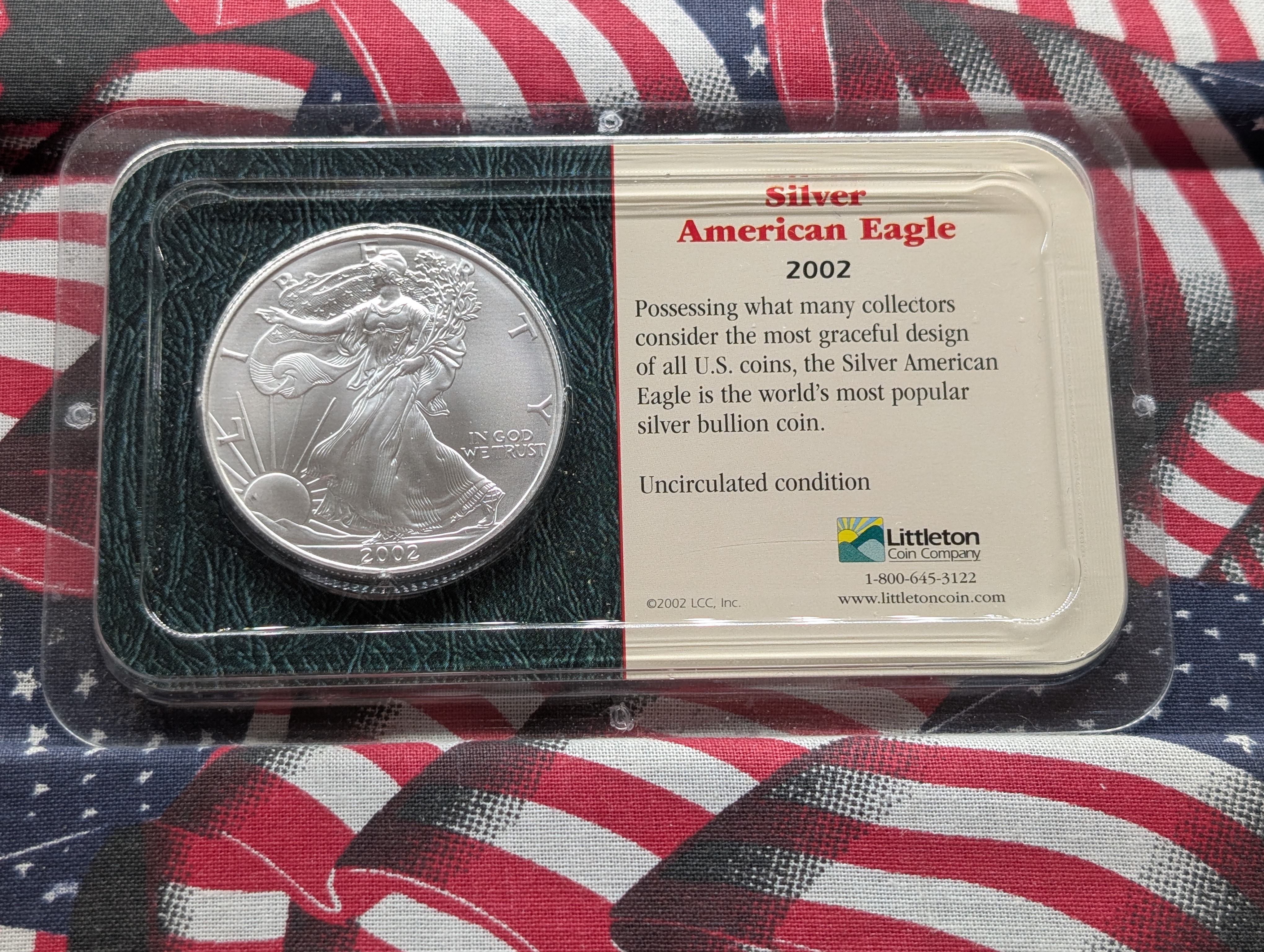 2002 American Silver Eagle In Littleton Plastic Holder, 99.9% Silver, One Troy Ounce