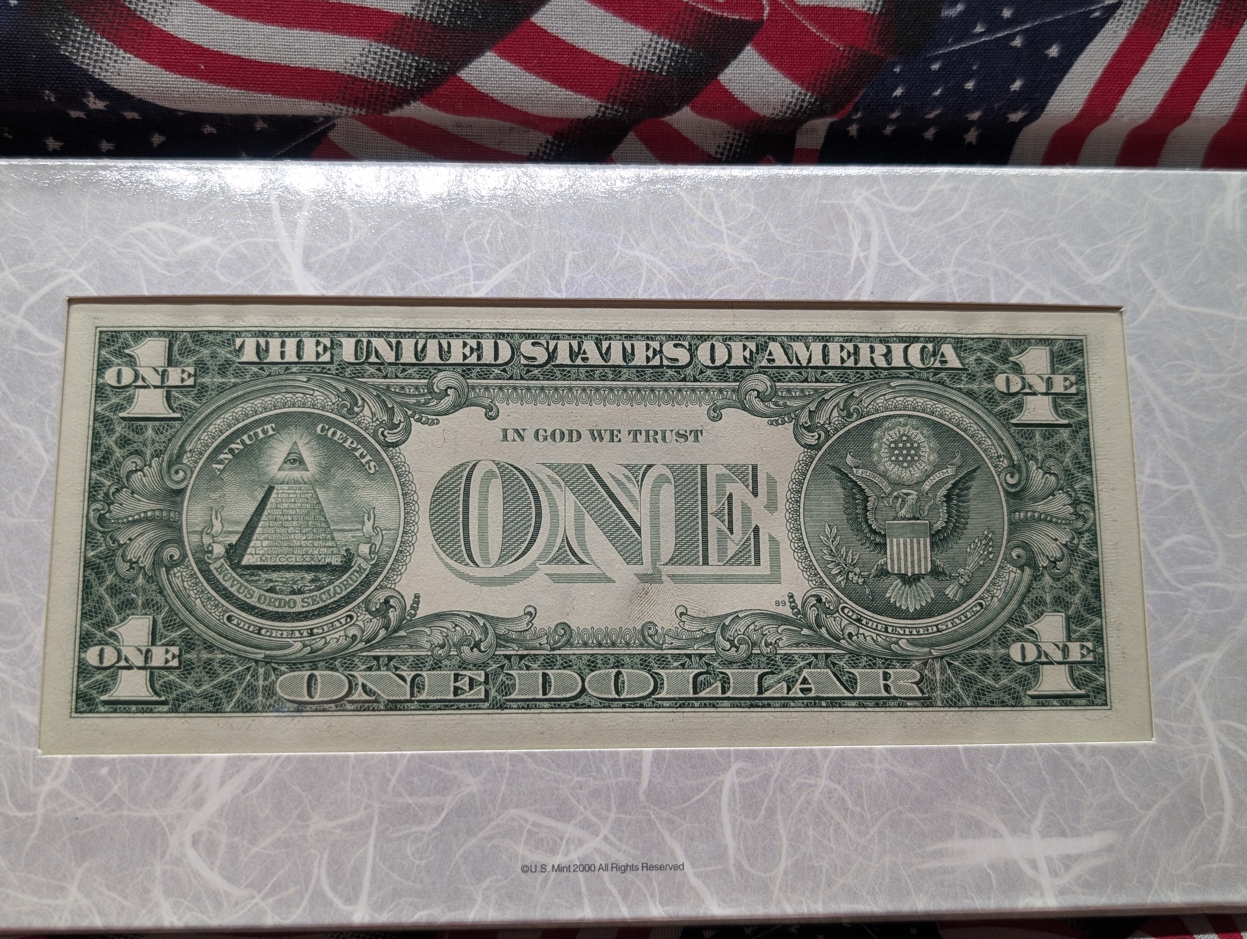 The U.S. Millenium Coinage And Currency Set, 2000 Sacagawea One Dollar, 2000 American Silver Eagle, & 1999 One Dollar Bank Note, with 2000 I