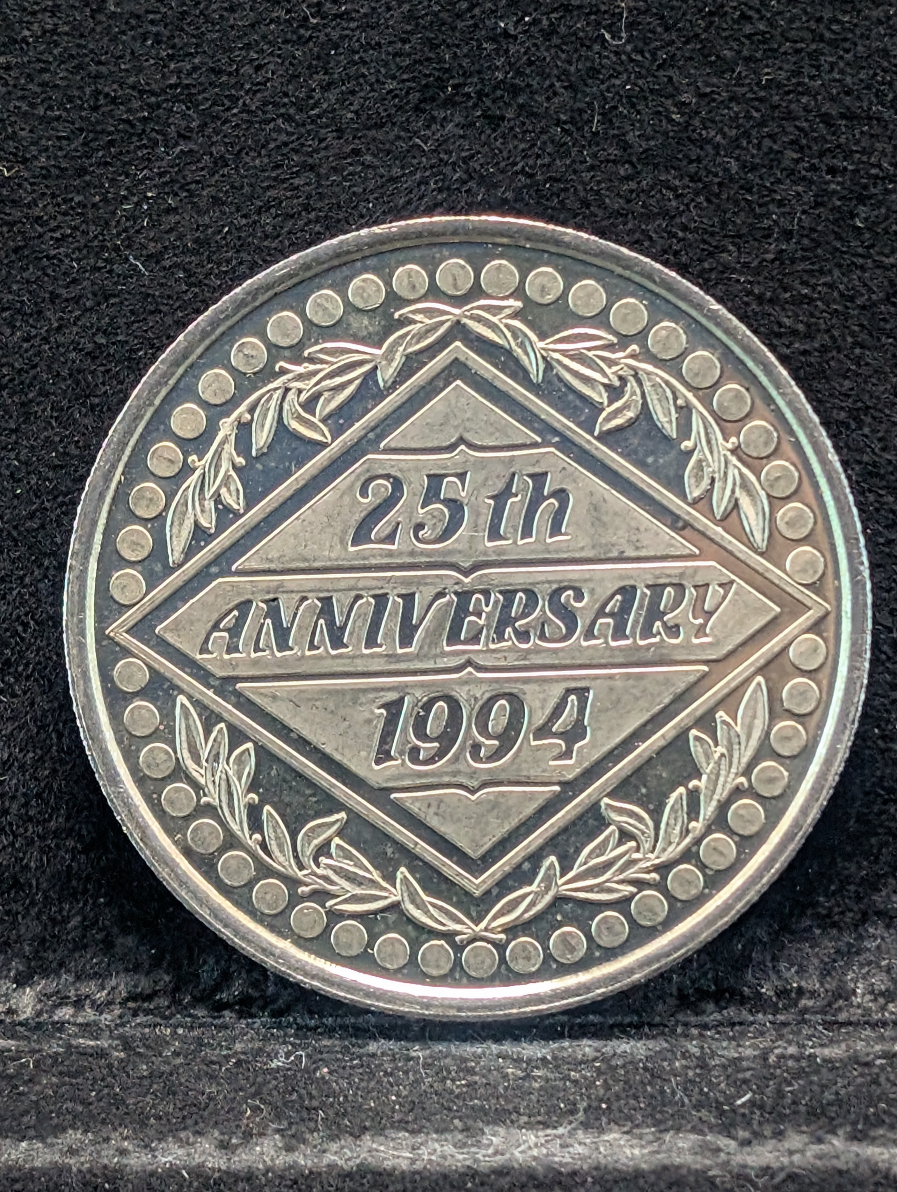1994 25th Anniversary Silver Round, One Ounce, .999 Fine Silver