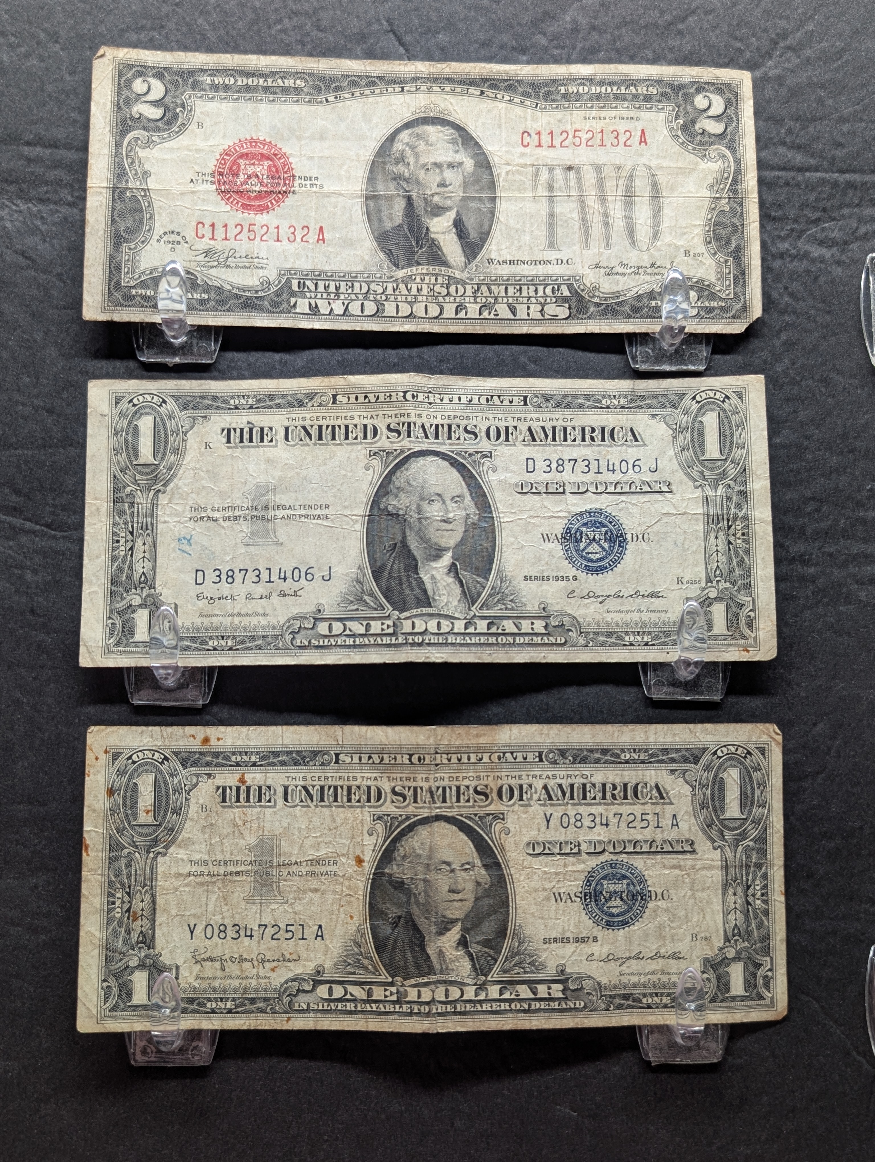 1935-G Series $1 Silver Certificate Note, 1957-B Series $1 Silver Certificate Note, & 1928-D Series $2 U.S. Red Seal Note