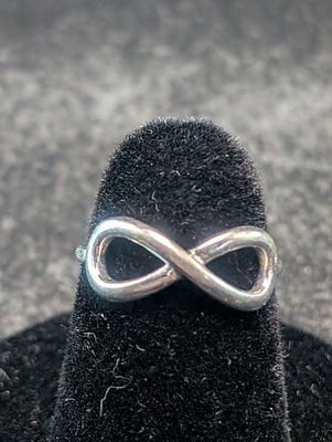 Woman's Sterling Silver Infinity Symbol Design, Size 5 Ring, Marked CIJ China 925.Ring Weighs 