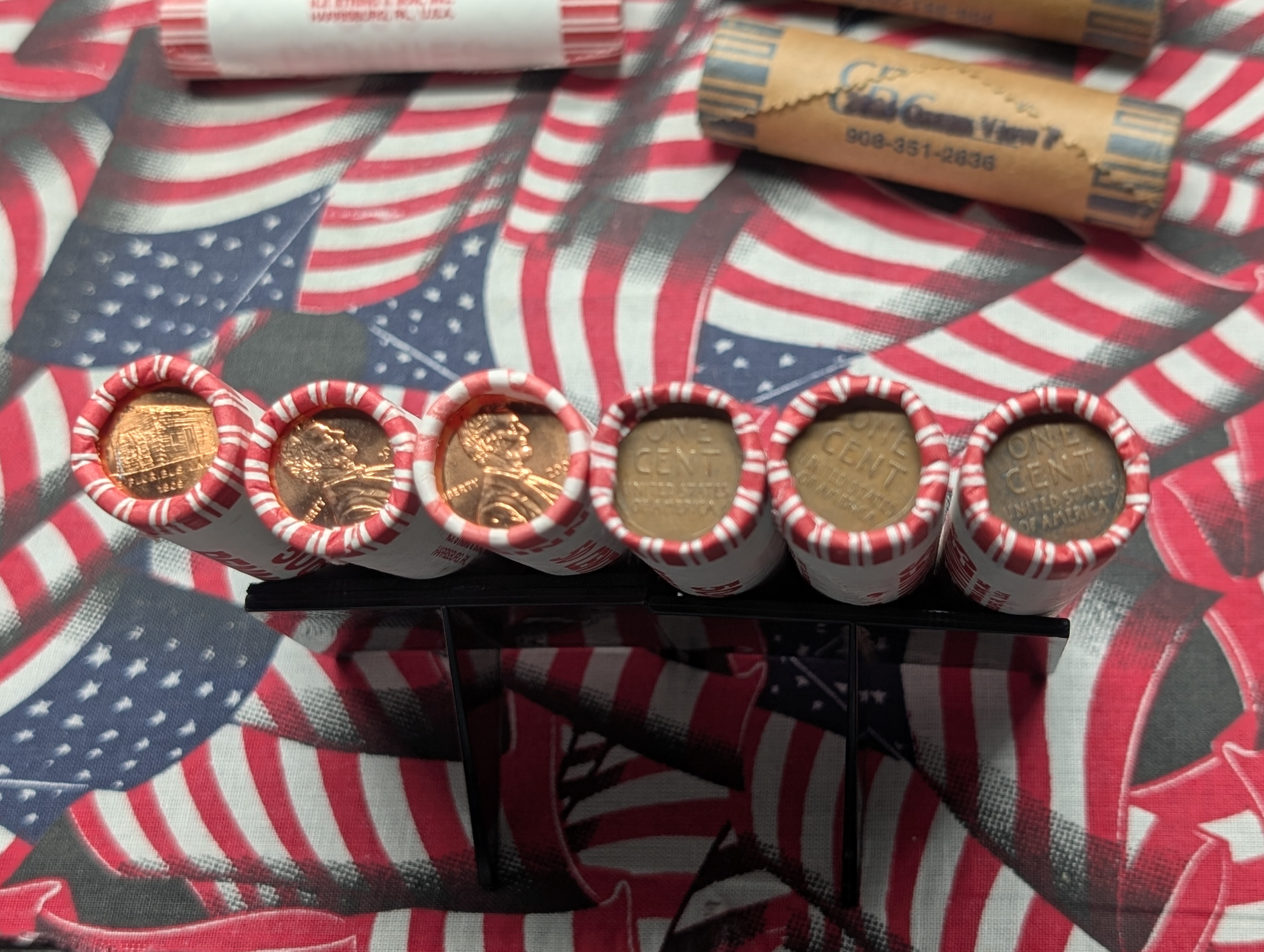 10 Rolls of 2009-P&D Lincoln Cents, 10 Rolls of Mixed Dates Lincoln Wheat Cents, 3 Rolls of 2004-P Keelboat Nickels and 2 Rolls of 2005-P Oc