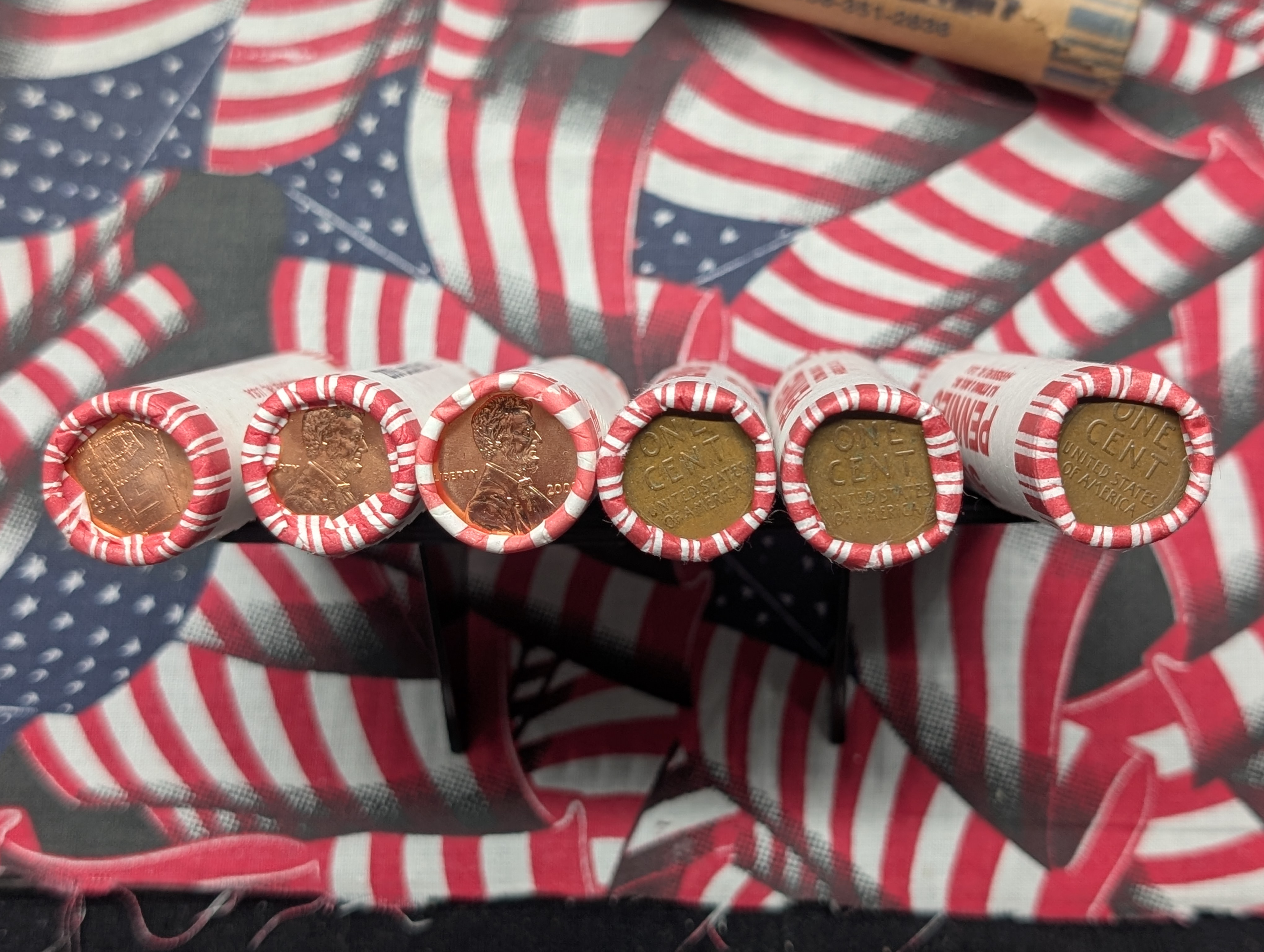 10 Rolls of 2009-P&D Lincoln Cents, 10 Rolls of Mixed Dates Lincoln Wheat Cents, 3 Rolls of 2004-P Keelboat Nickels and 2 Rolls of 2005-P Oc