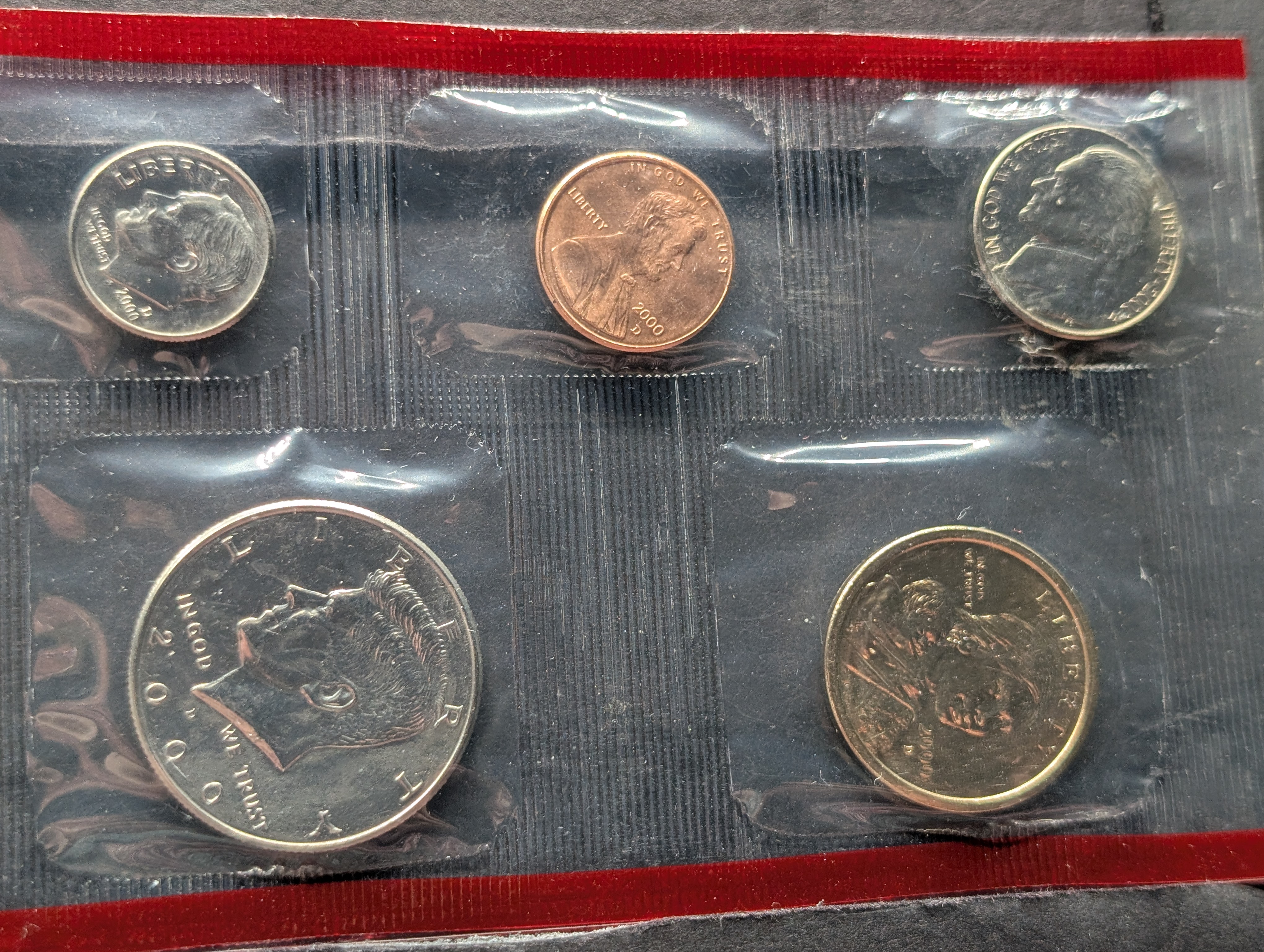 2000-P&D United States Mint Coin Set with State Quarters and 2 Sacagawea Dollars