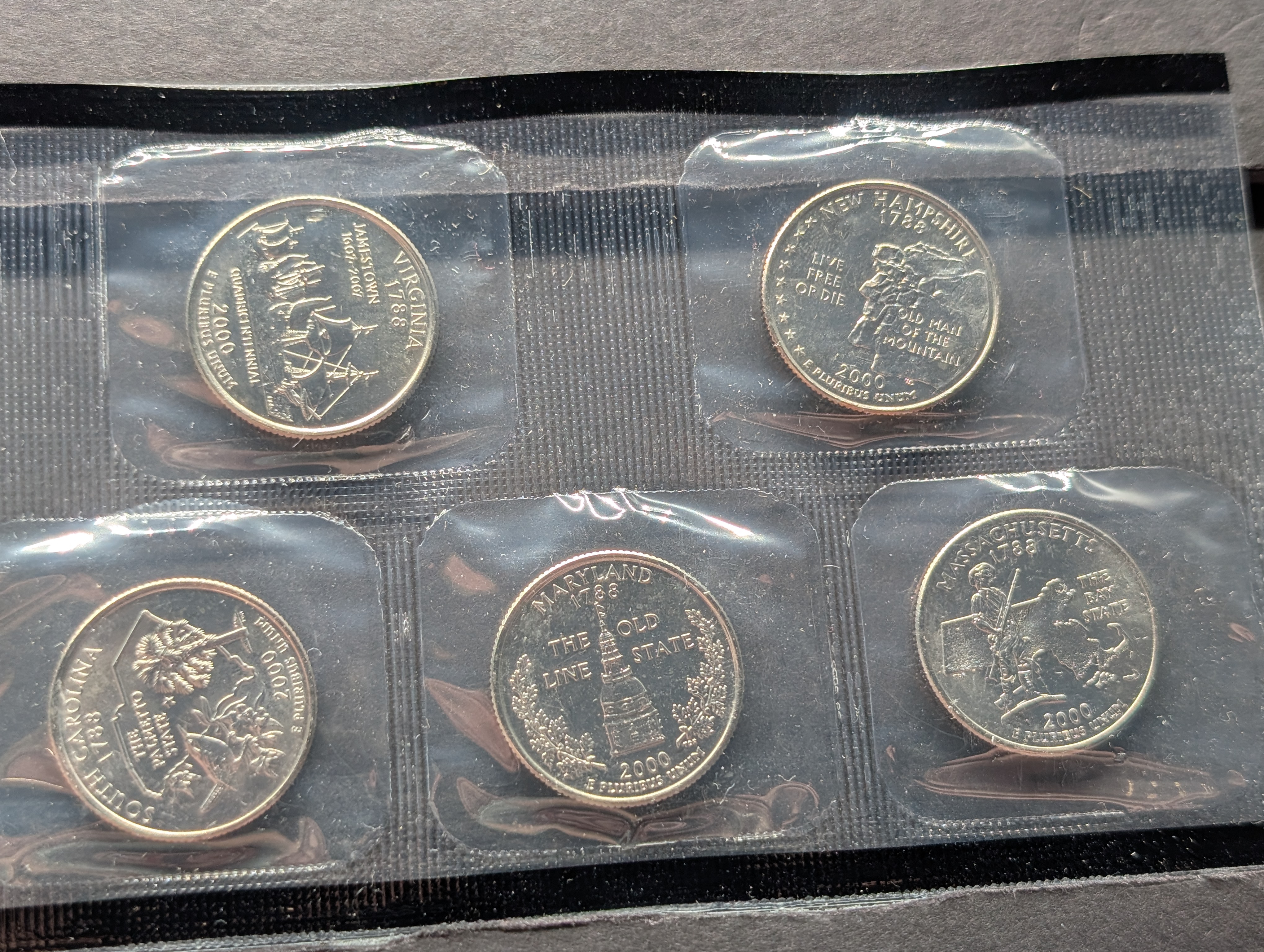 2000-P&D United States Mint Coin Set with State Quarters and 2 Sacagawea Dollars