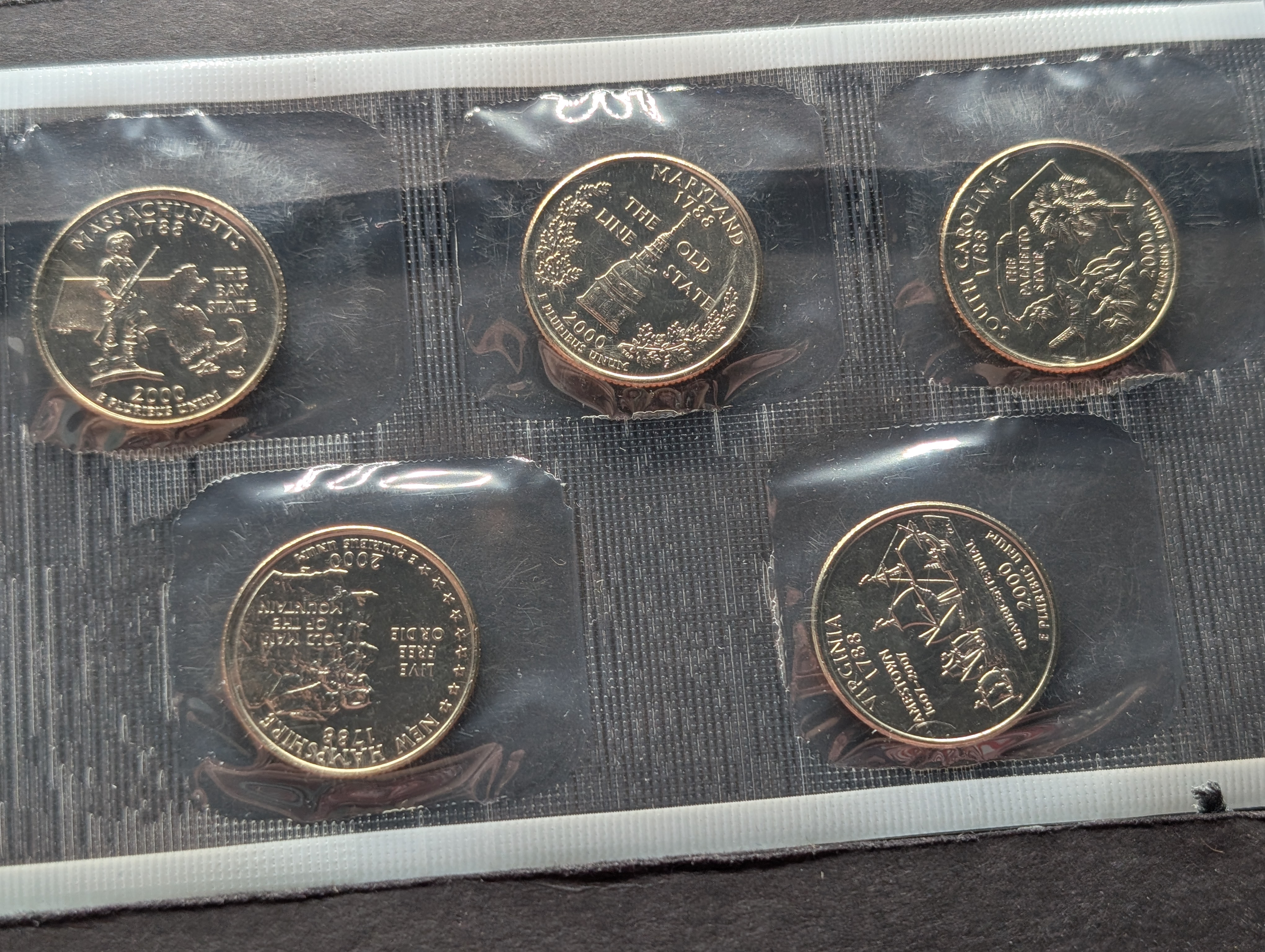 2000-P&D United States Mint Coin Set with State Quarters and 2 Sacagawea Dollars
