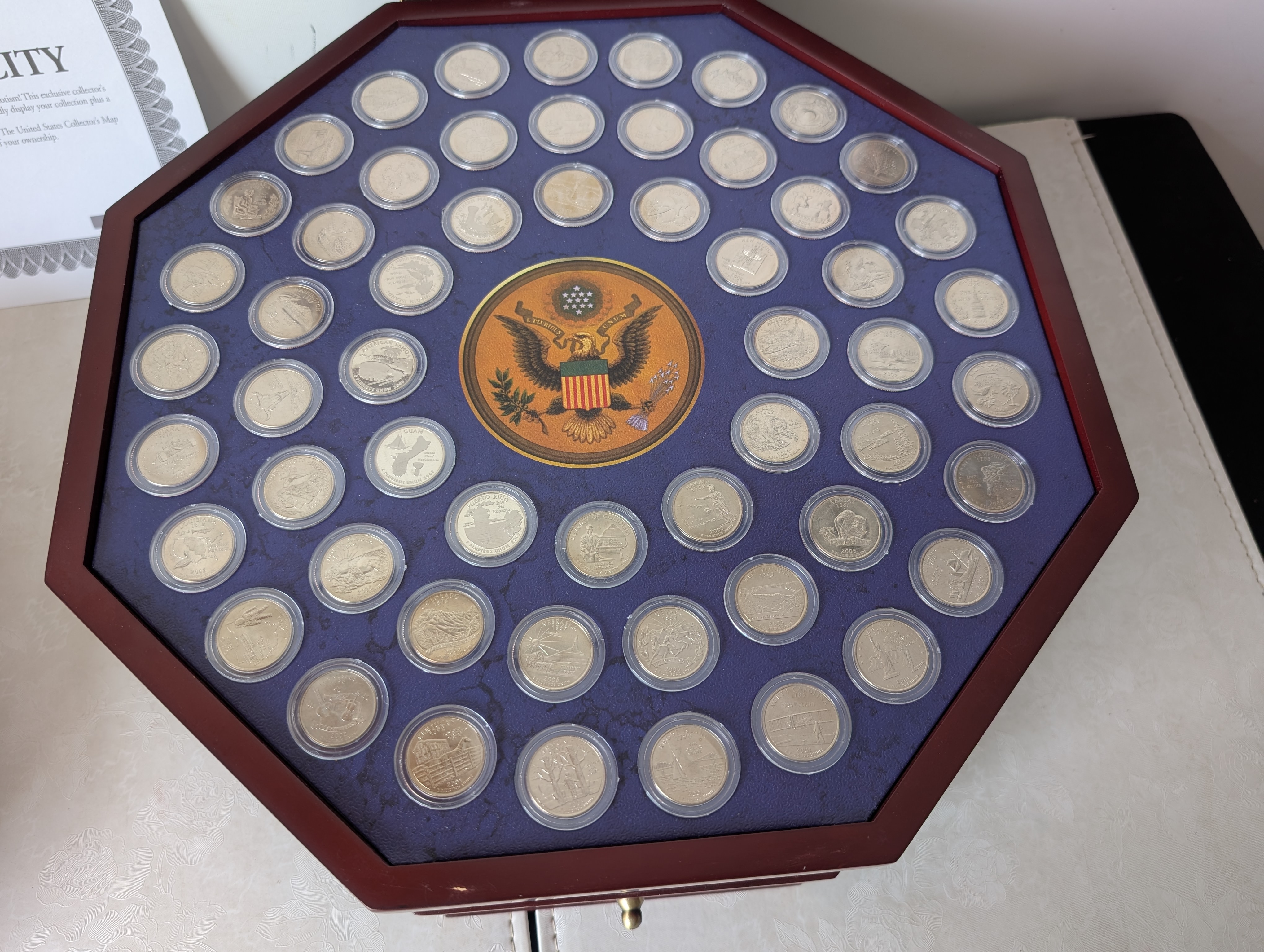 Complete Set of Denver Minted State and Territorial Quarters Single Coins and Capsules with 56 - $25 Uncirculated Half Dollar Rolls