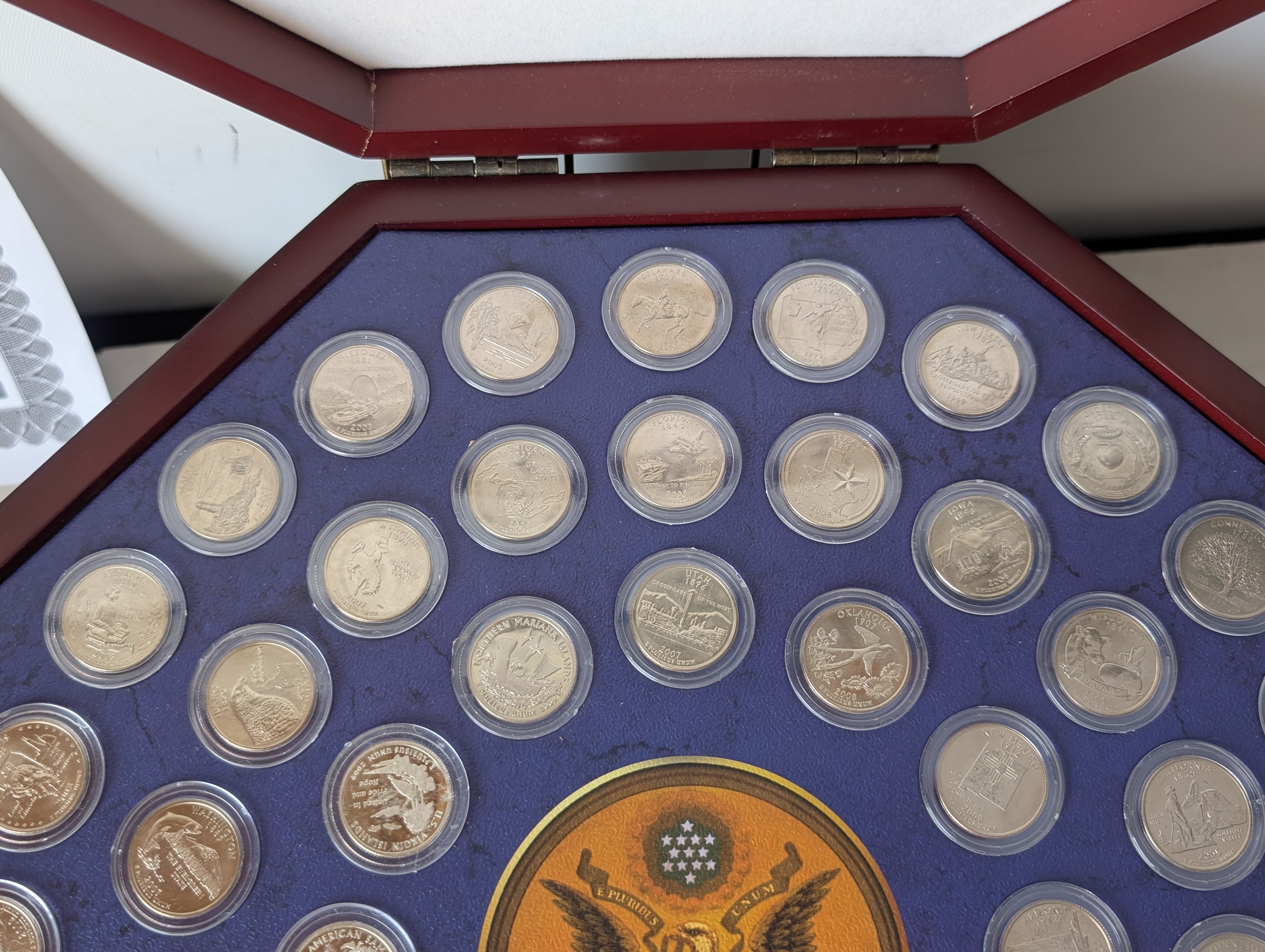 Complete Set of Denver Minted State and Territorial Quarters Single Coins and Capsules with 56 - $25 Uncirculated Half Dollar Rolls