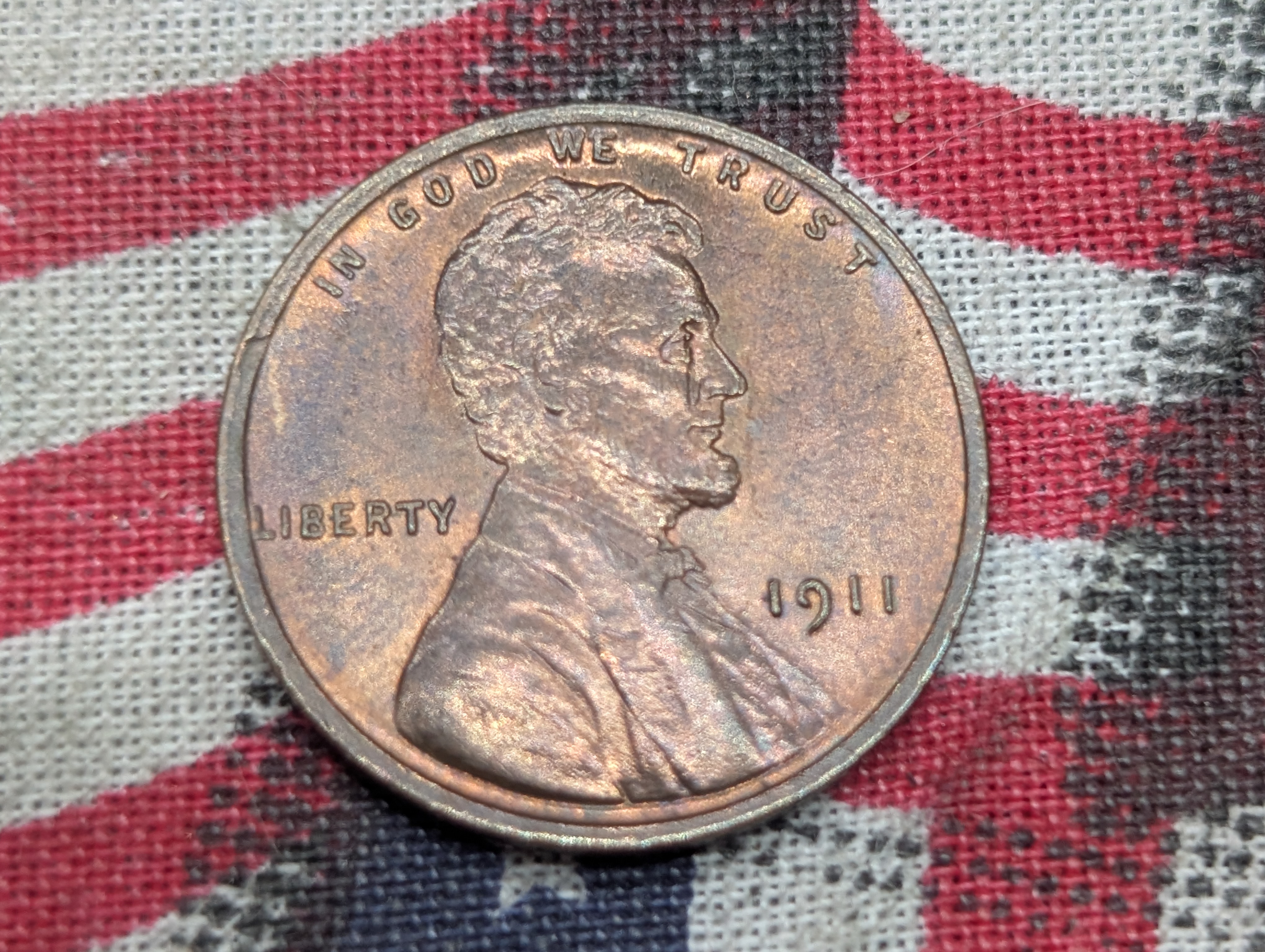 1911-P Lincoln Wheat Cent - Brown Uncirculated with some red.