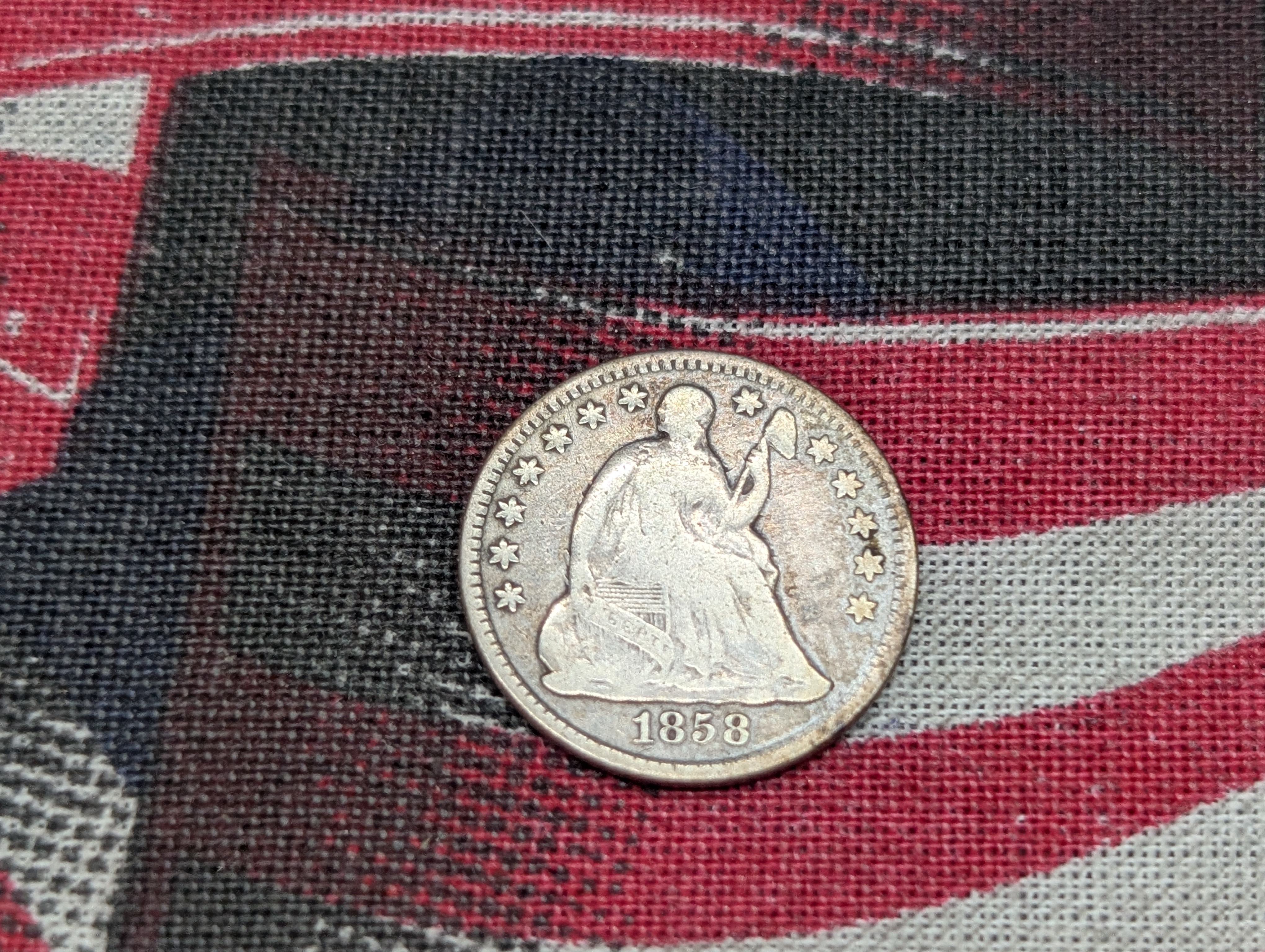 1858 Silver Seated Liberty Half Dime