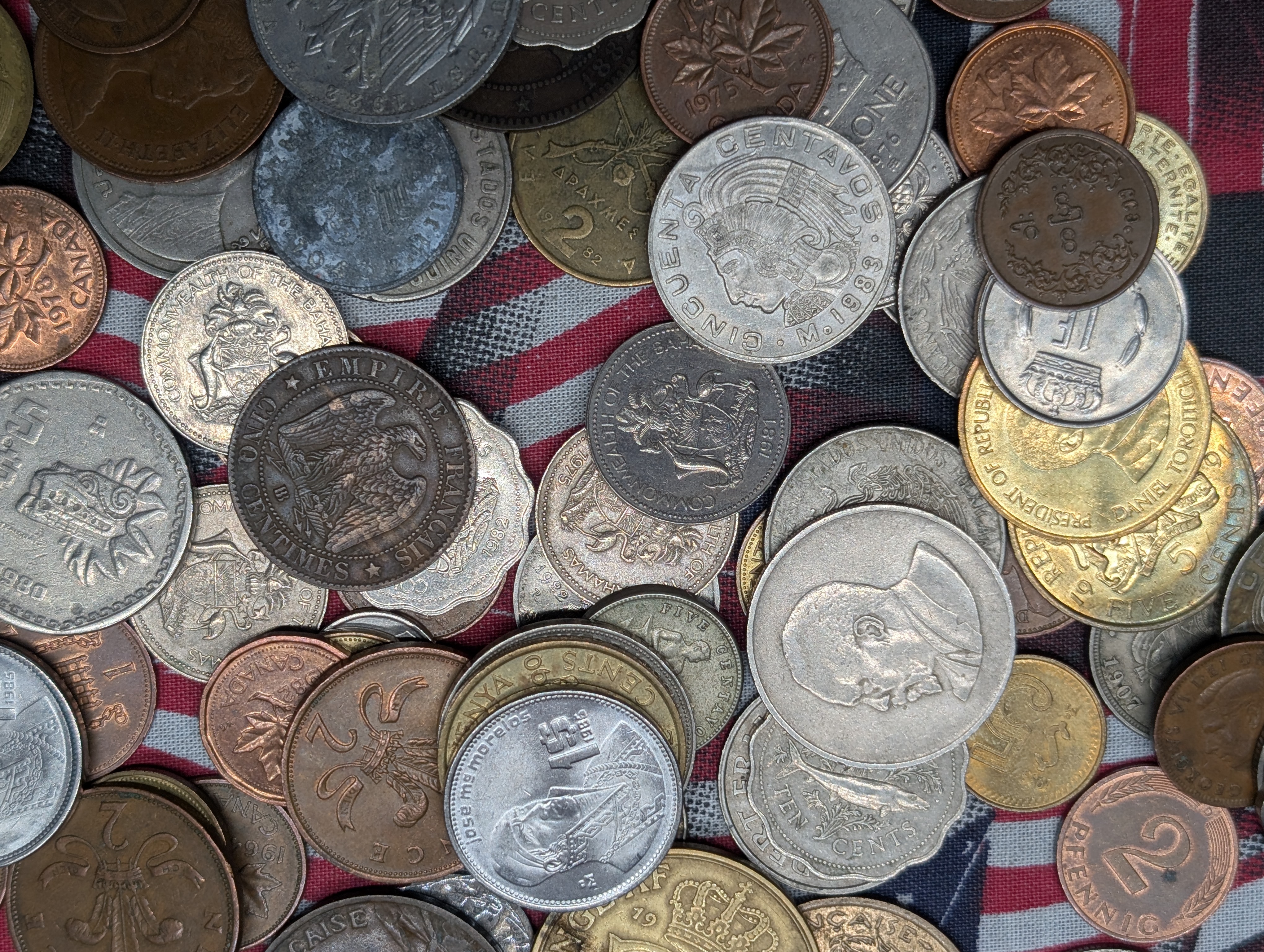 16+ Oz. Of Unsearched Foreign Coins - A Glance Shows Some Silver