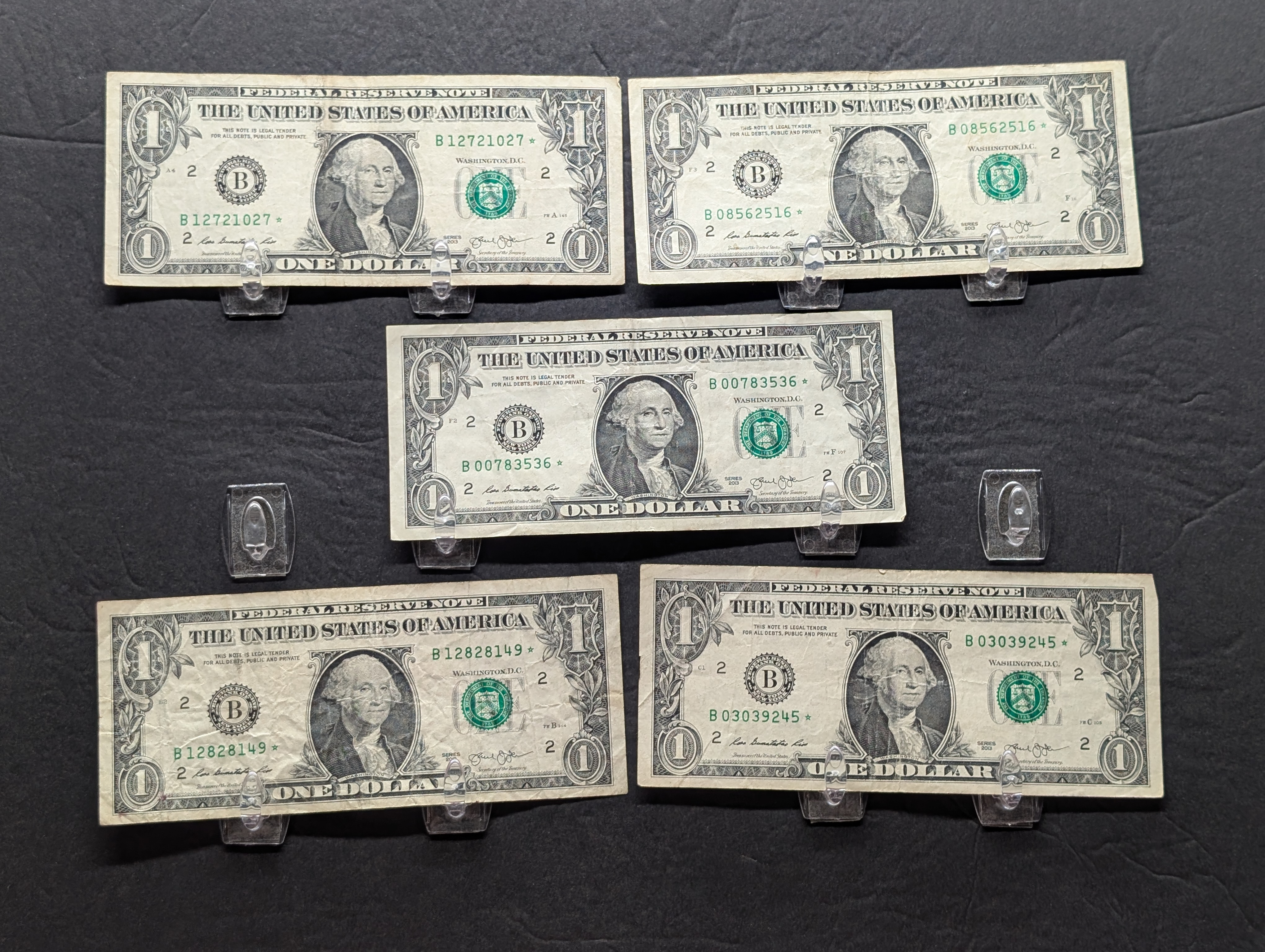 (5) 2013 Series One Dollar Star Replacement Notes, New York, One is a James Bond Star Note.