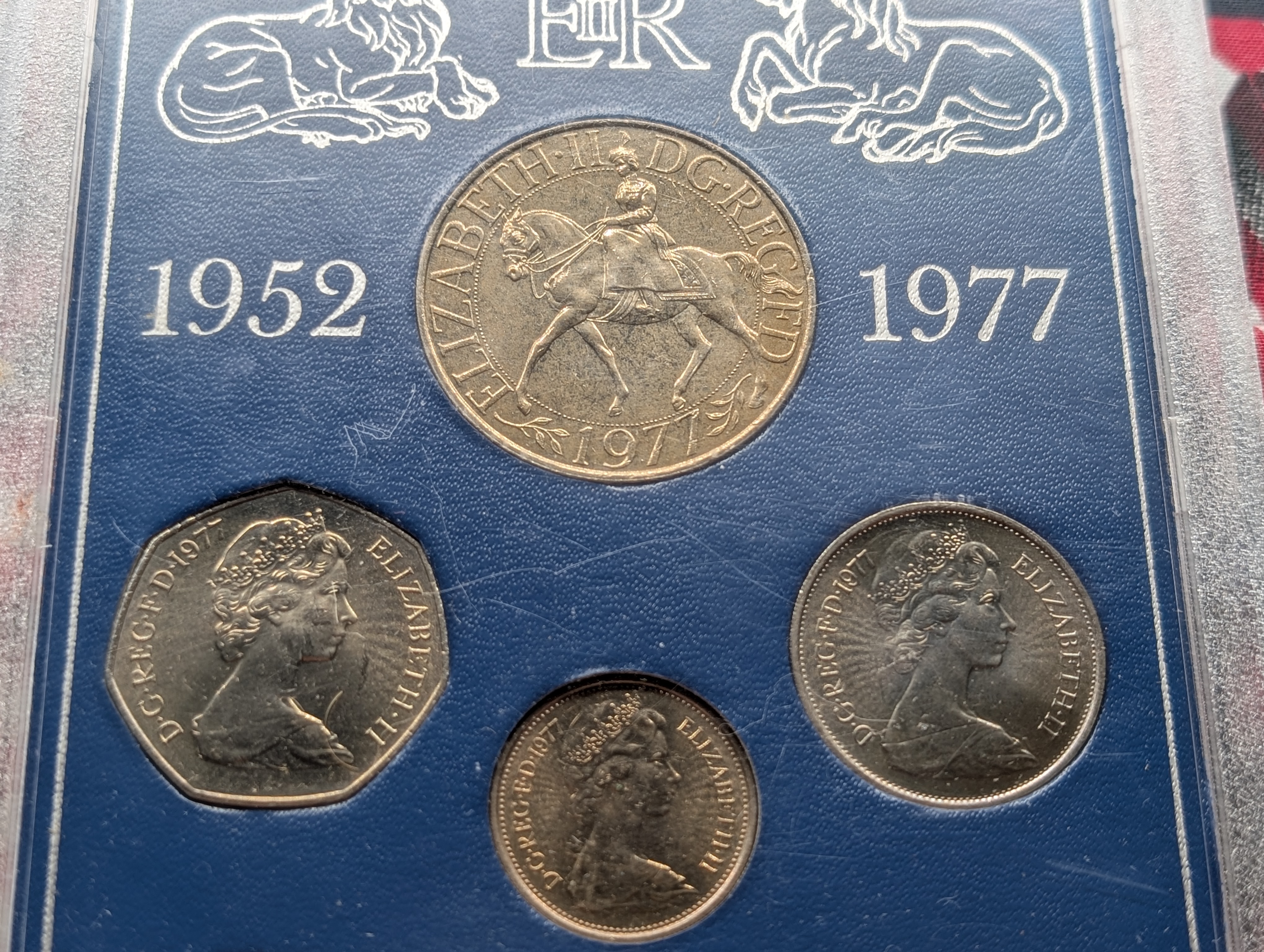 1952-1977 British Silver Jubilee Set, Case Is Cracked, Seven Coin Set.