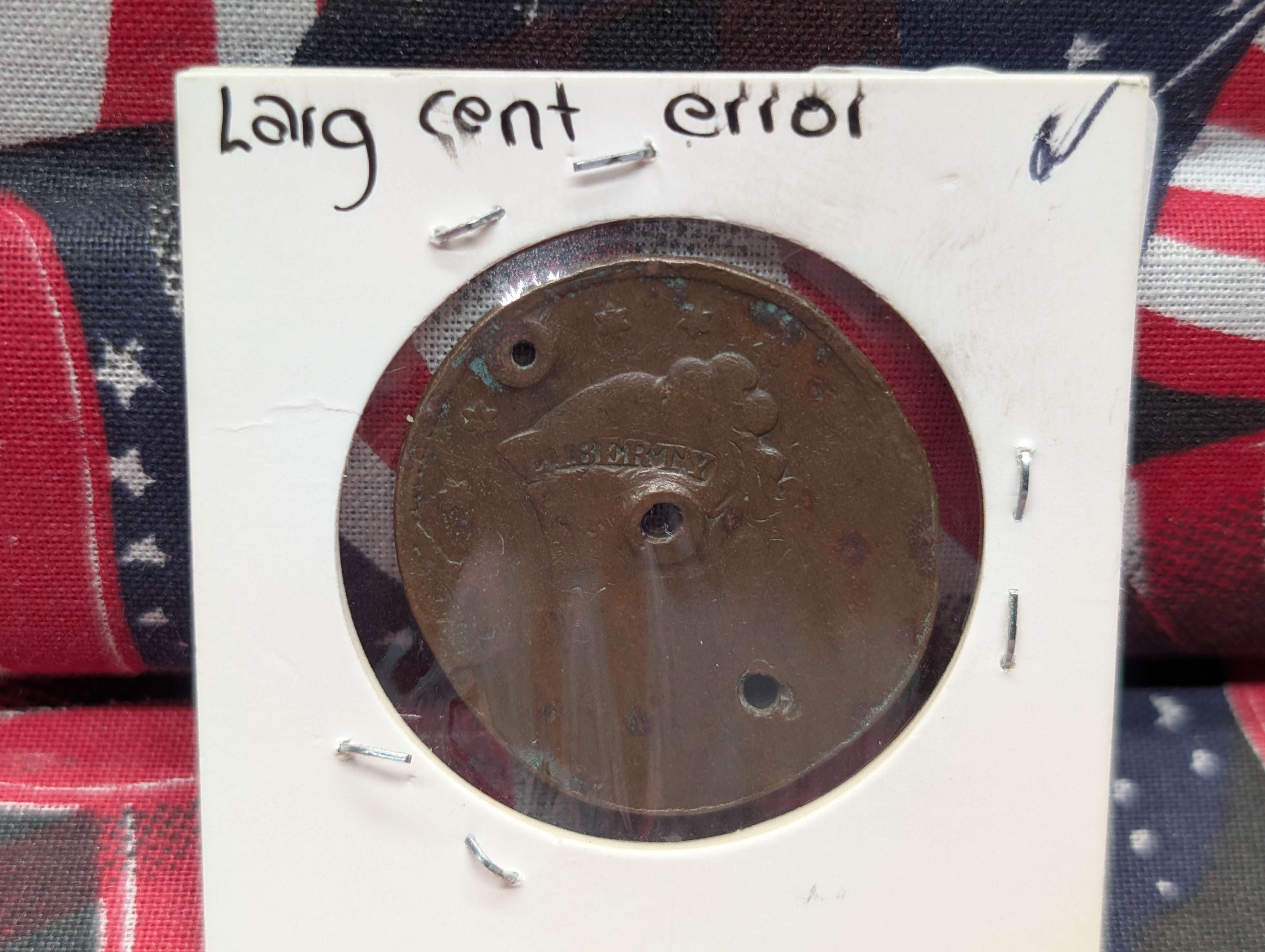 Large Cent (environmental damage / holed and damaged planchet)