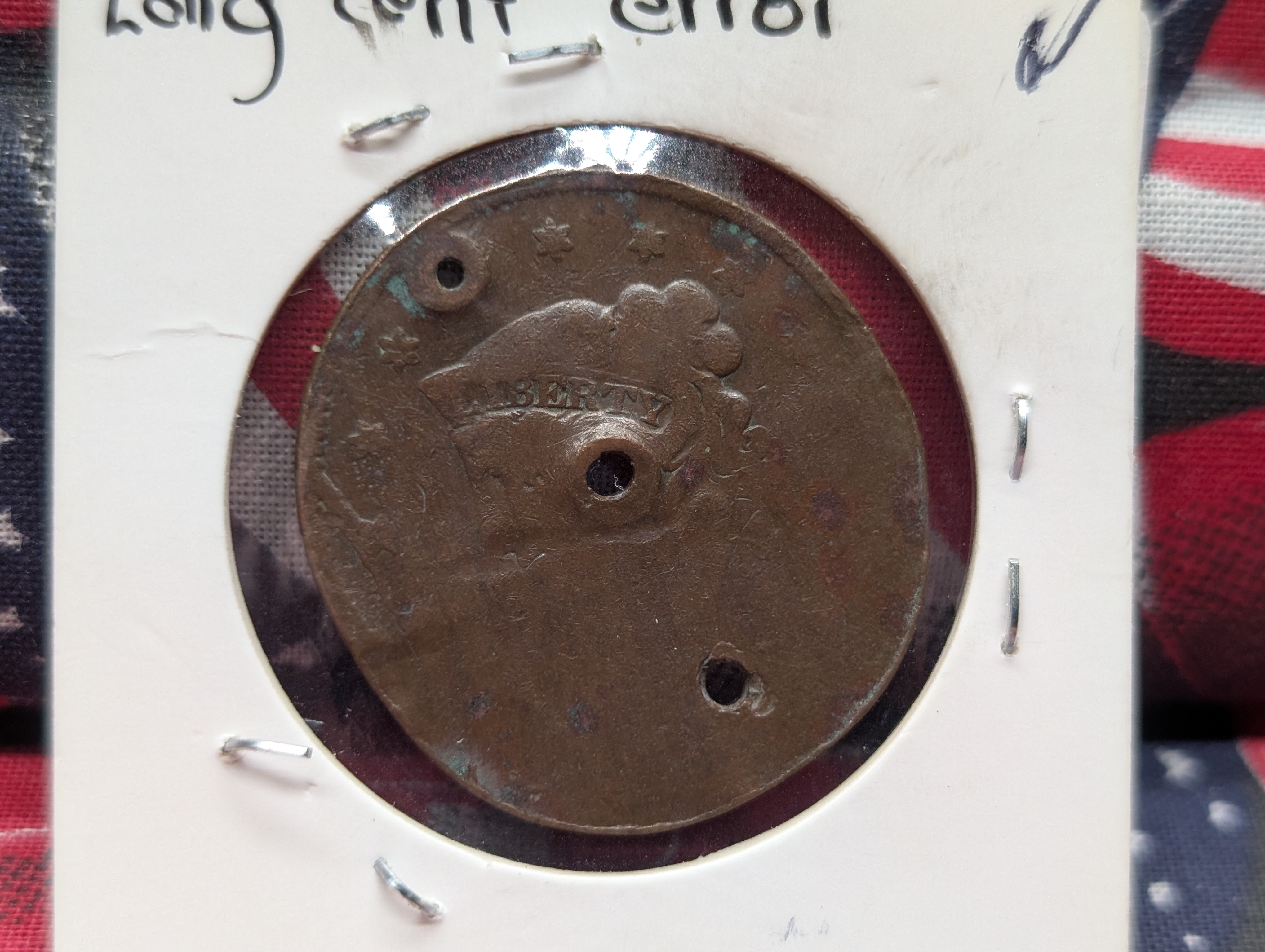 Large Cent (environmental damage / holed and damaged planchet)