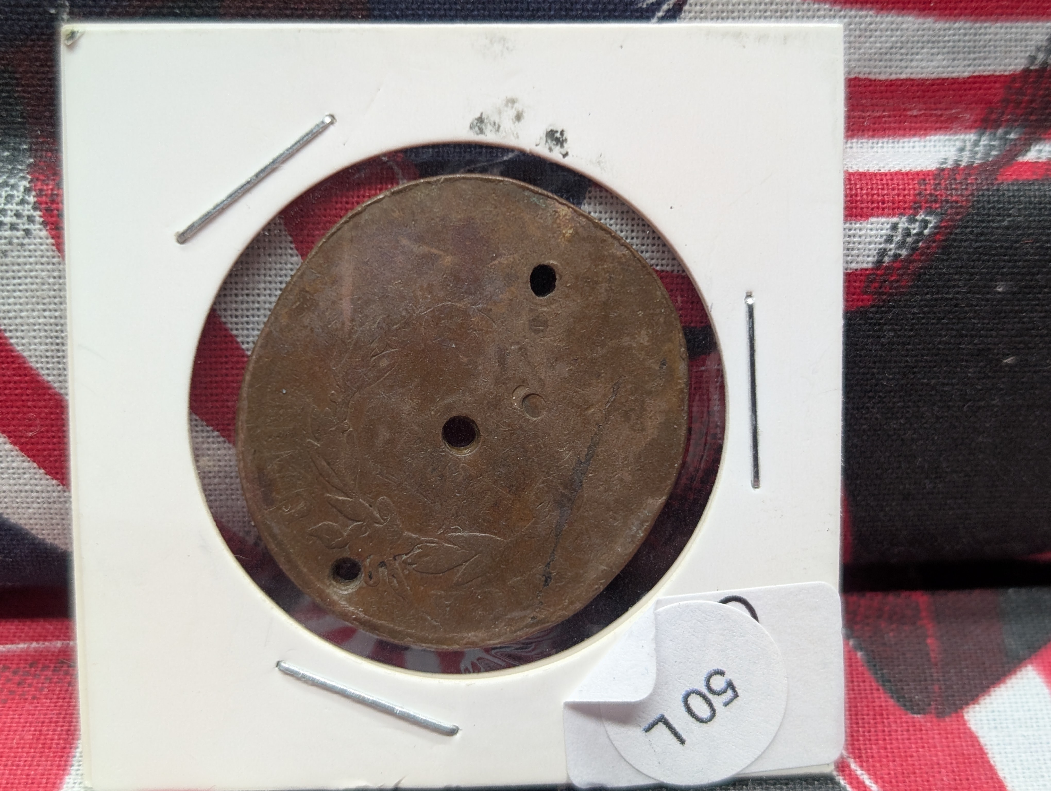 Large Cent (environmental damage / holed and damaged planchet)