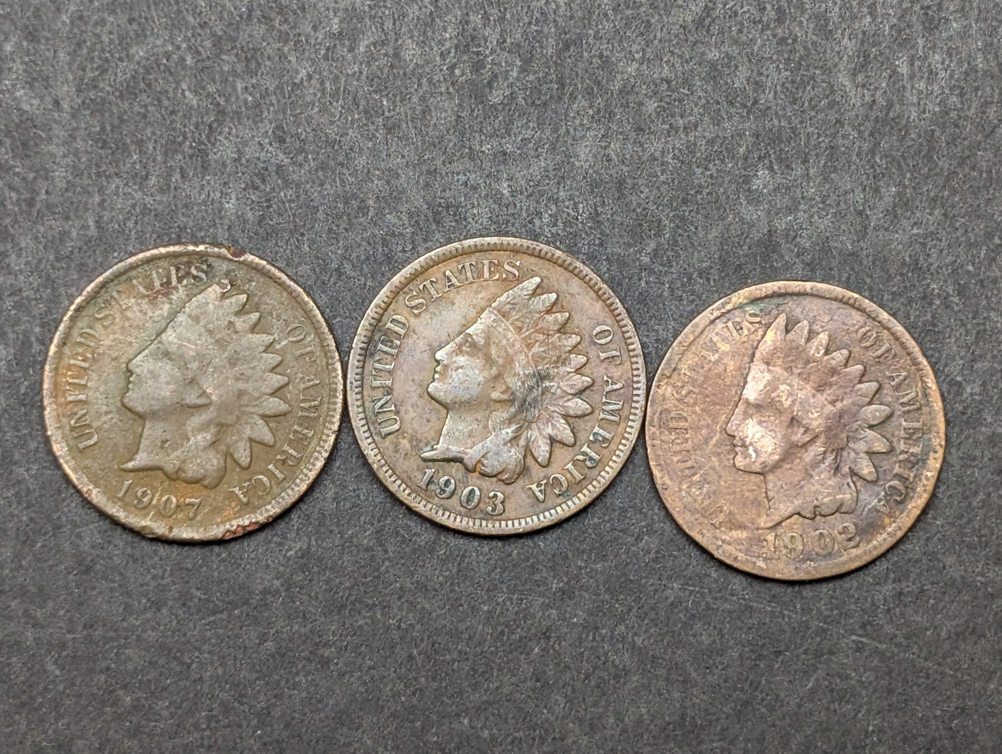 1900, 1902, (3) 1903, (2) 1905, 1906, (2) 1907 Indian Head Cents
