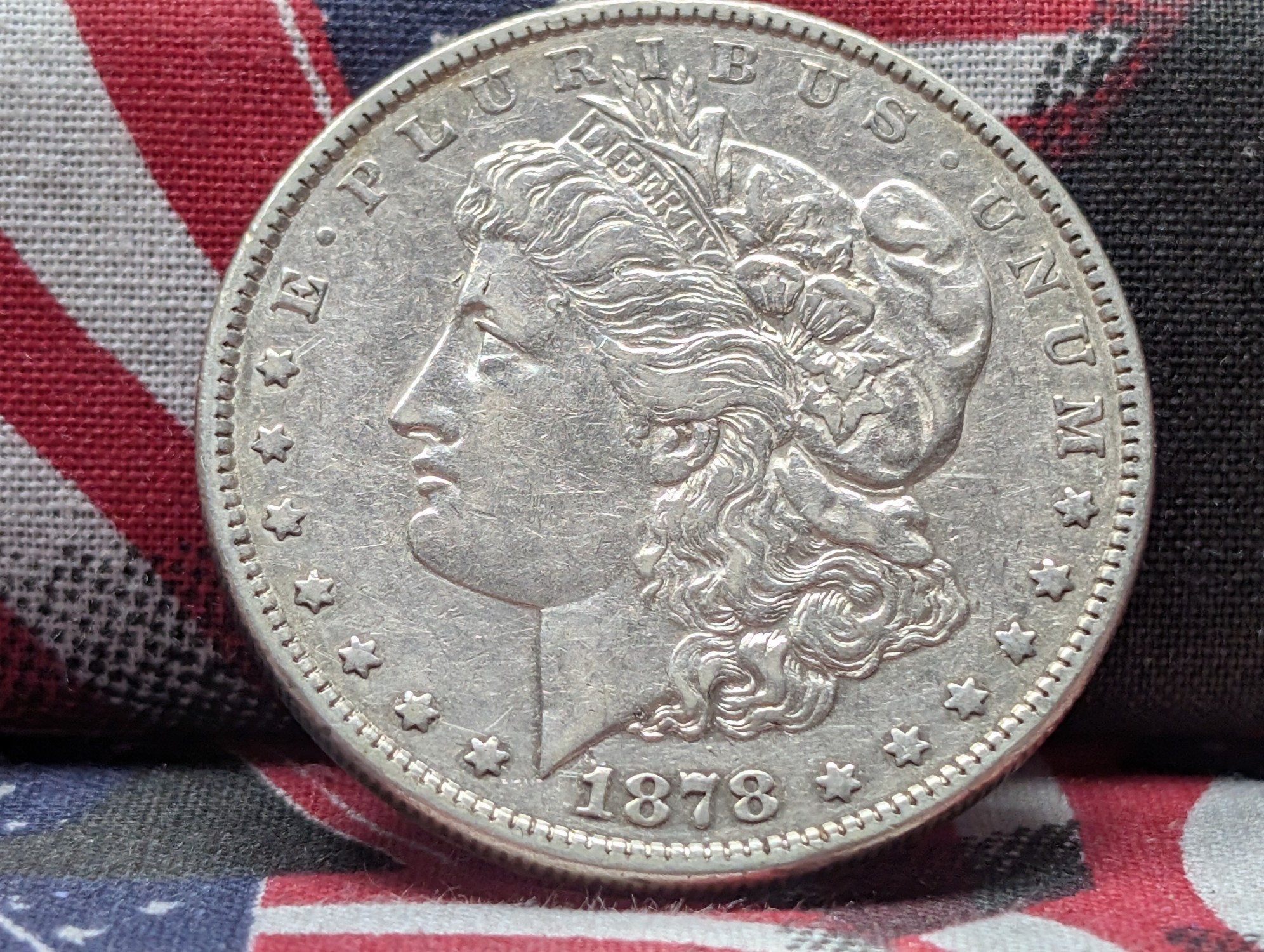 1878 7TF rev 79 Morgan Silver Dollar, 90% Silver