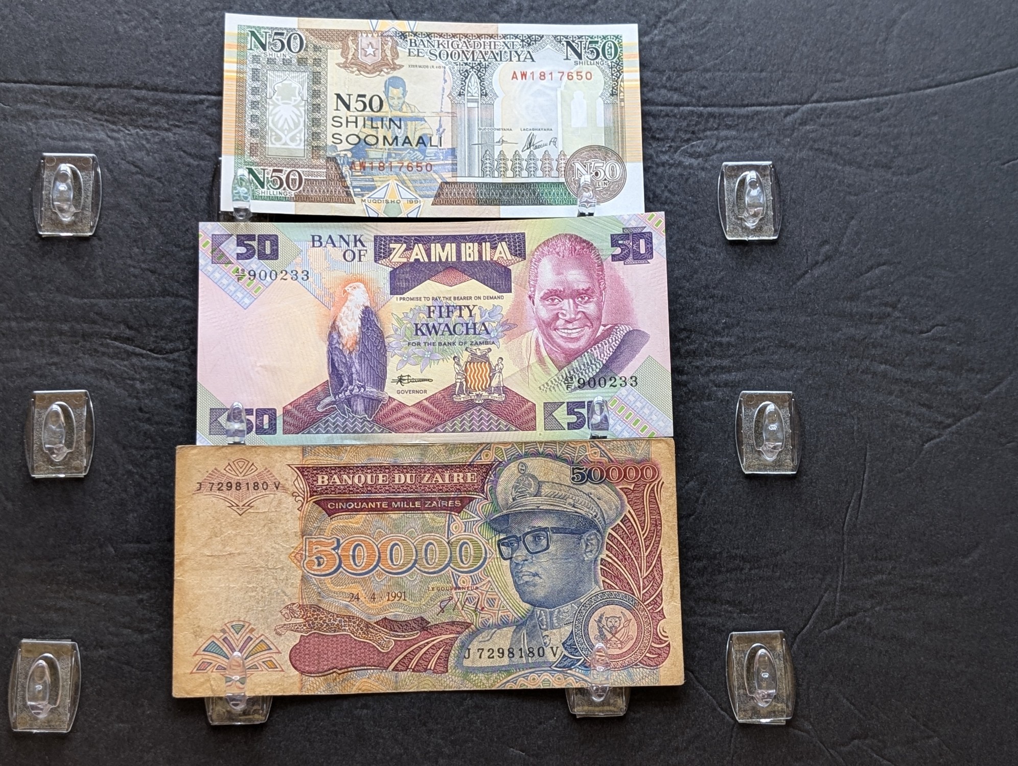 (3) 1991 East Africa, Zambia, and Zaire Banknotes