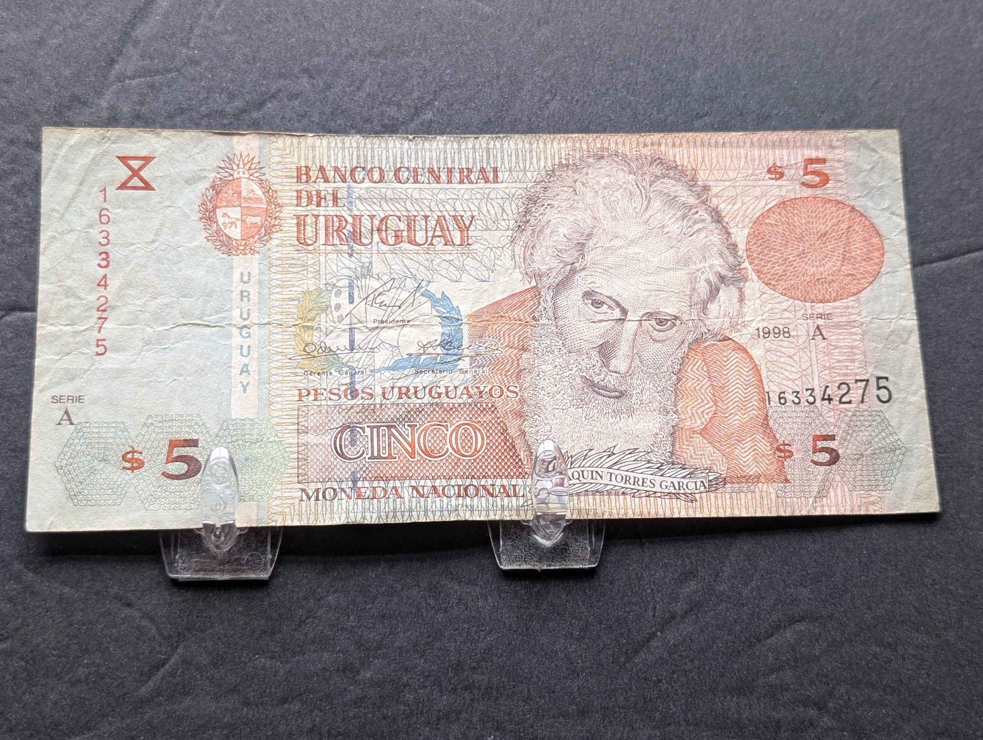 (3) International Banknotes from Bangladesh, Uruguay, and Argentina