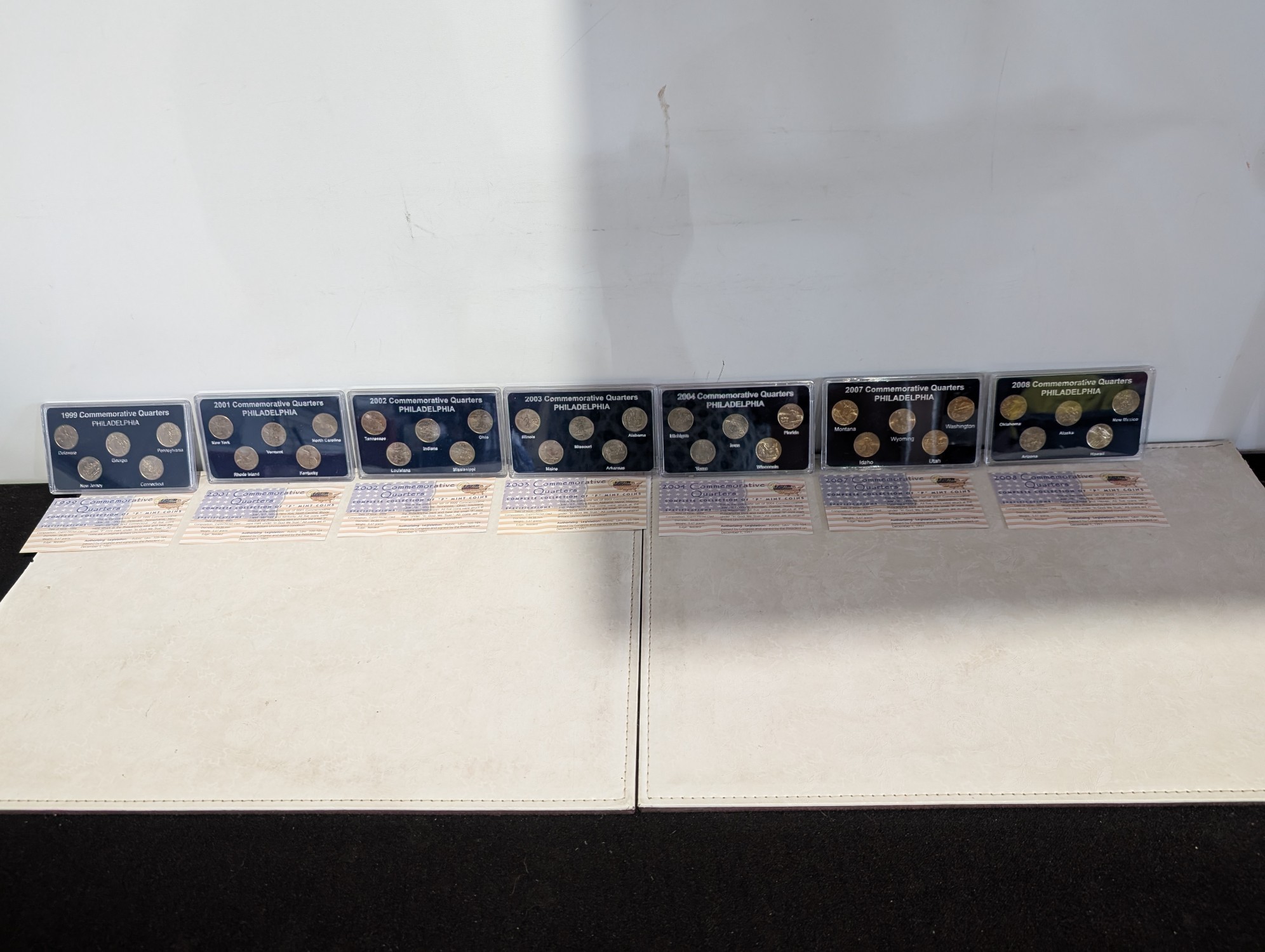 1999, 2001-2004, 2007, & 2008 Philadelphia Mint Statehood Quarter Collections in Display w/ COA (7 Sets)