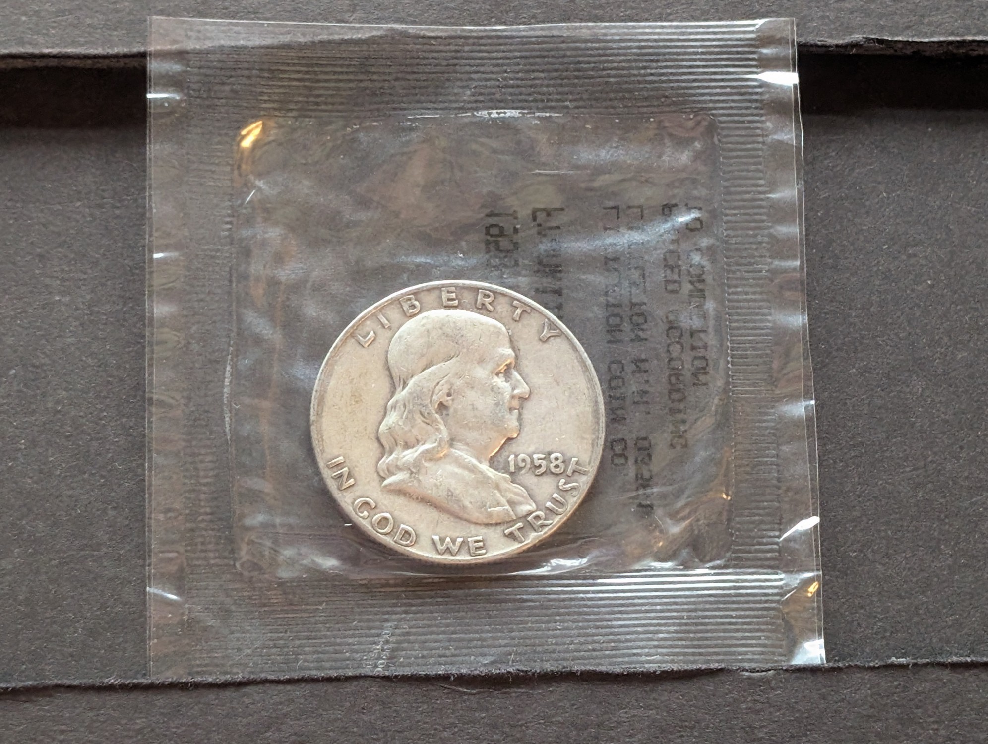 1958-D Franklin 90% Silver Half Dollar - Littleton Coin Packaging - Good Condition