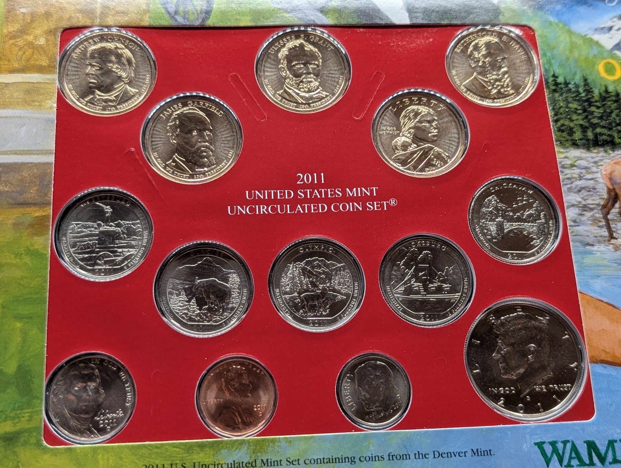 2011-D Only U.S. Mint Uncirculated Coin Set Including ATB Quarters, (4) Presidential Dollars, One Sacagawea Dollar and Stamps