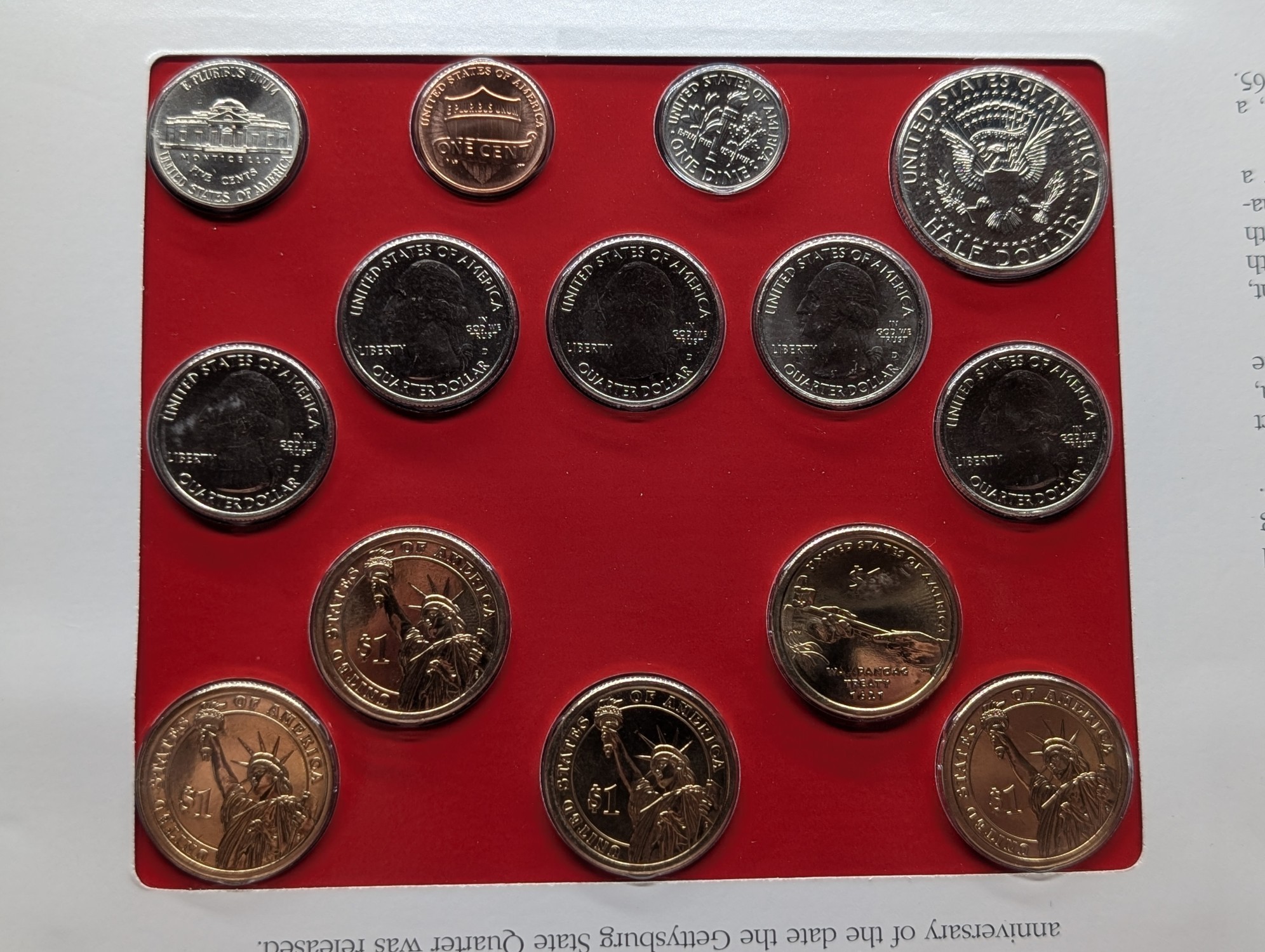 2011-D Only U.S. Mint Uncirculated Coin Set Including ATB Quarters, (4) Presidential Dollars, One Sacagawea Dollar and Stamps