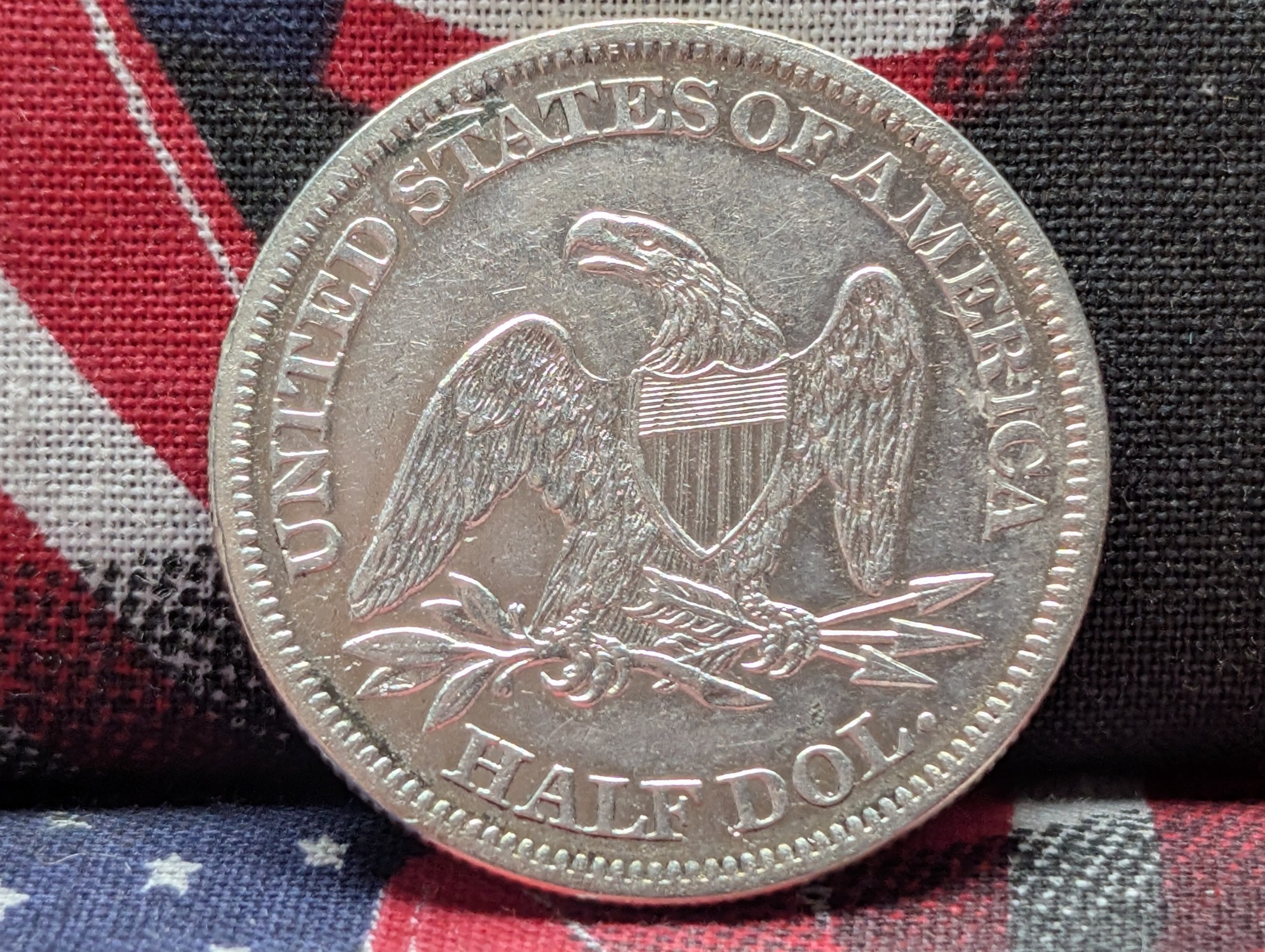 AU/UNC - 1865 w/ Drapery Seated Liberty 90% Silver Half Dollar