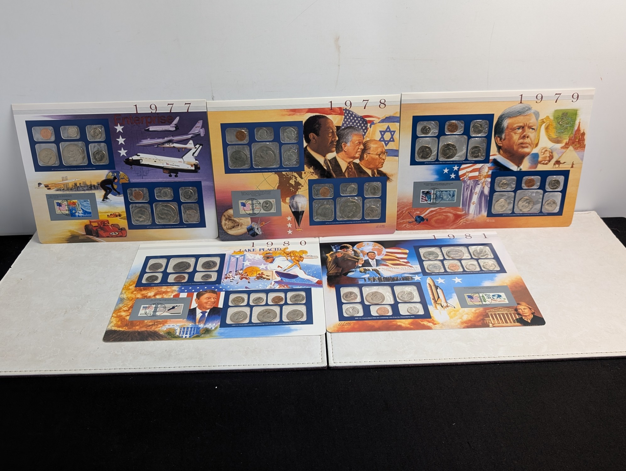 1977-1981 P&D U.S. Mint UNC Sets in Display w/ Commem Stamps (5 Sets)