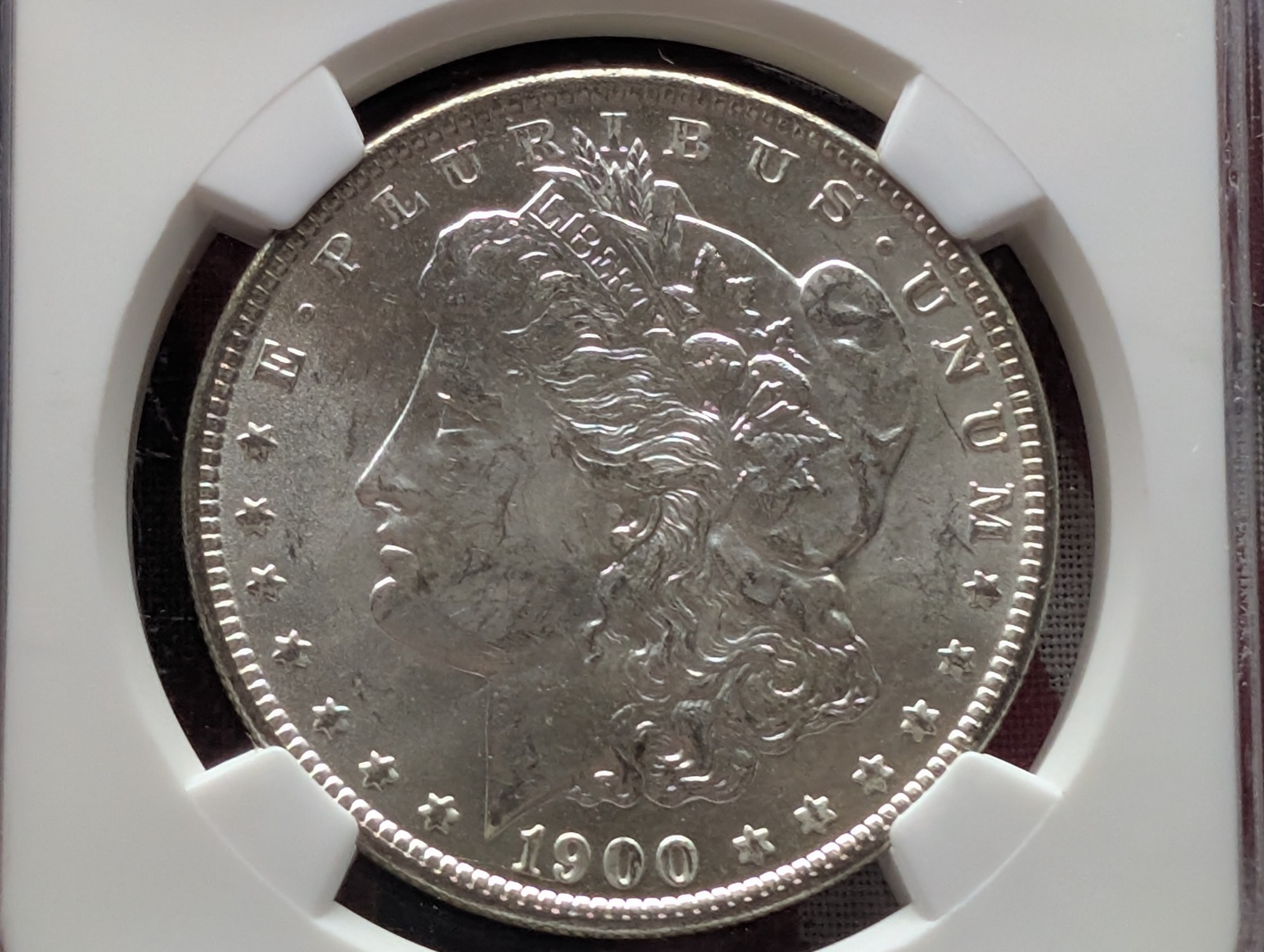 1900-O Morgan 90% Silver Dollar - NGC MS63