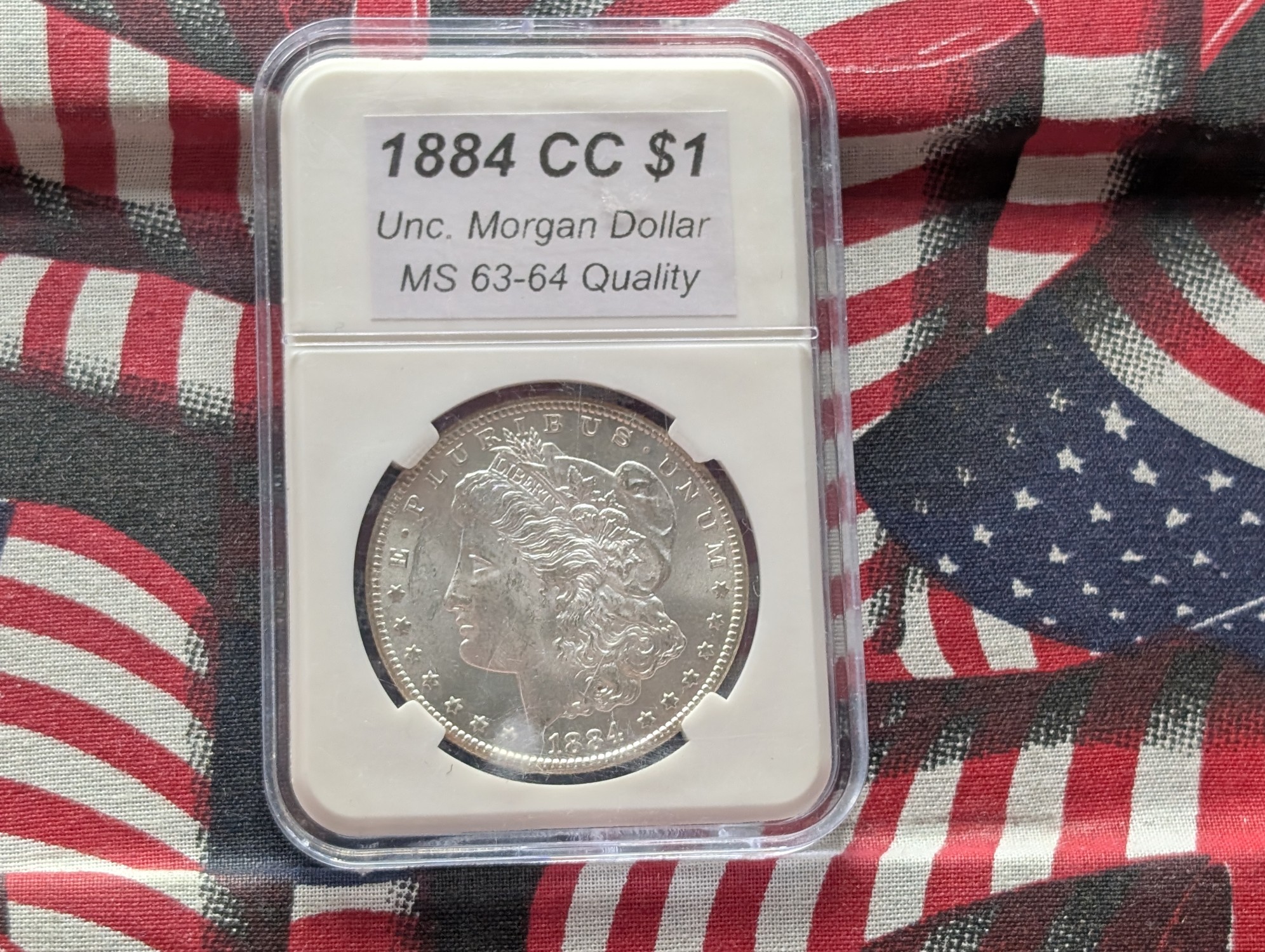 1884-CC Morgan 90% Silver Dollar - Slabbed MS63-64