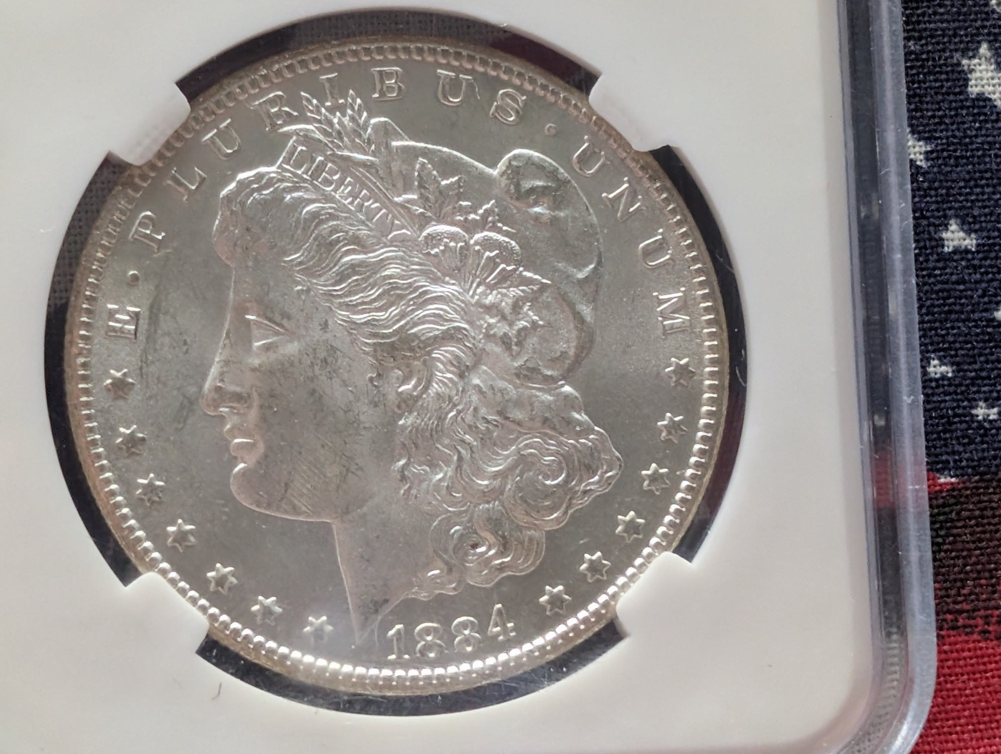 1884-CC Morgan 90% Silver Dollar - Slabbed MS63-64
