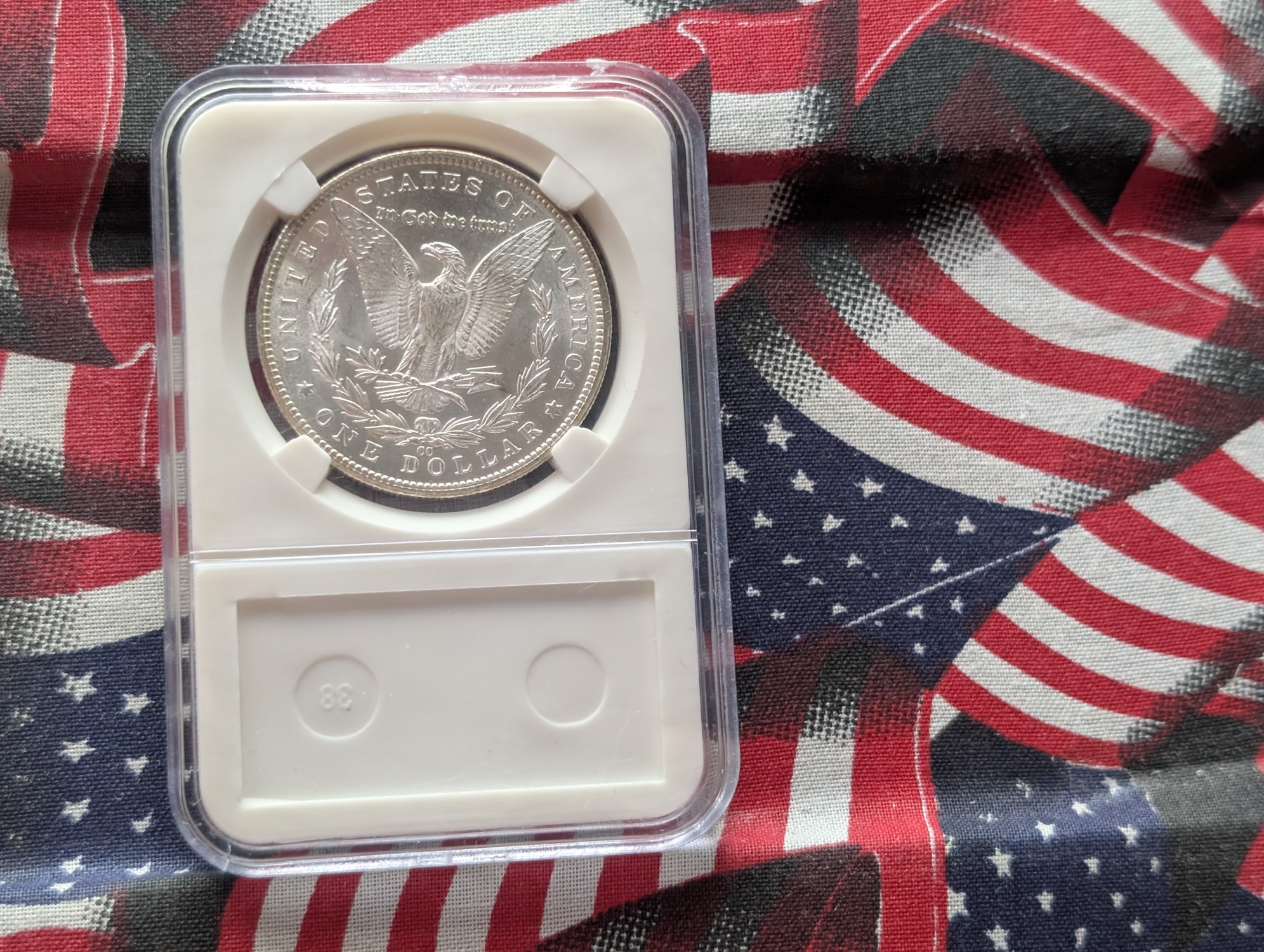 1884-CC Morgan 90% Silver Dollar - Slabbed MS63-64