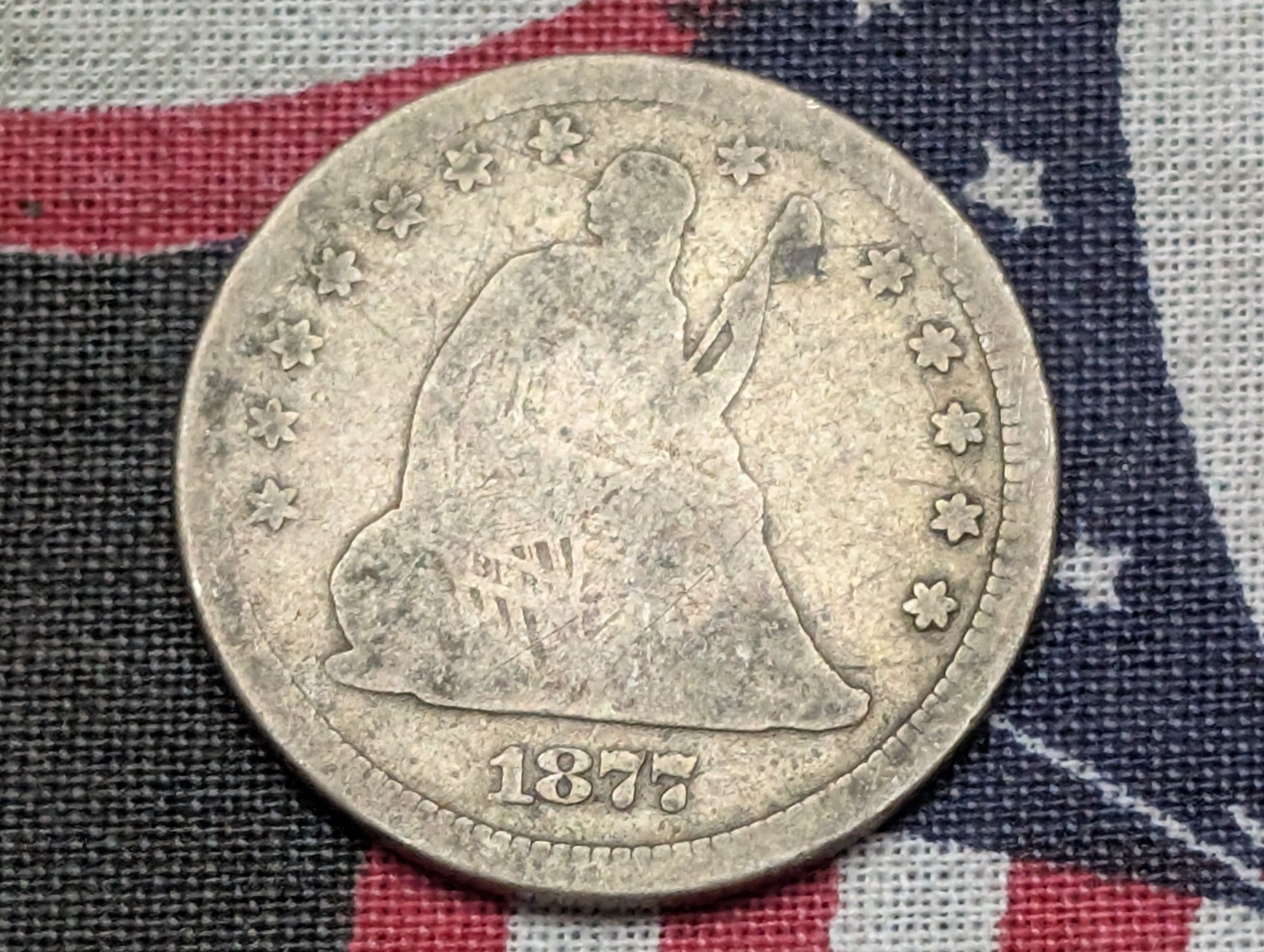 1877 Seated Liberty 90% Silver Quarter
